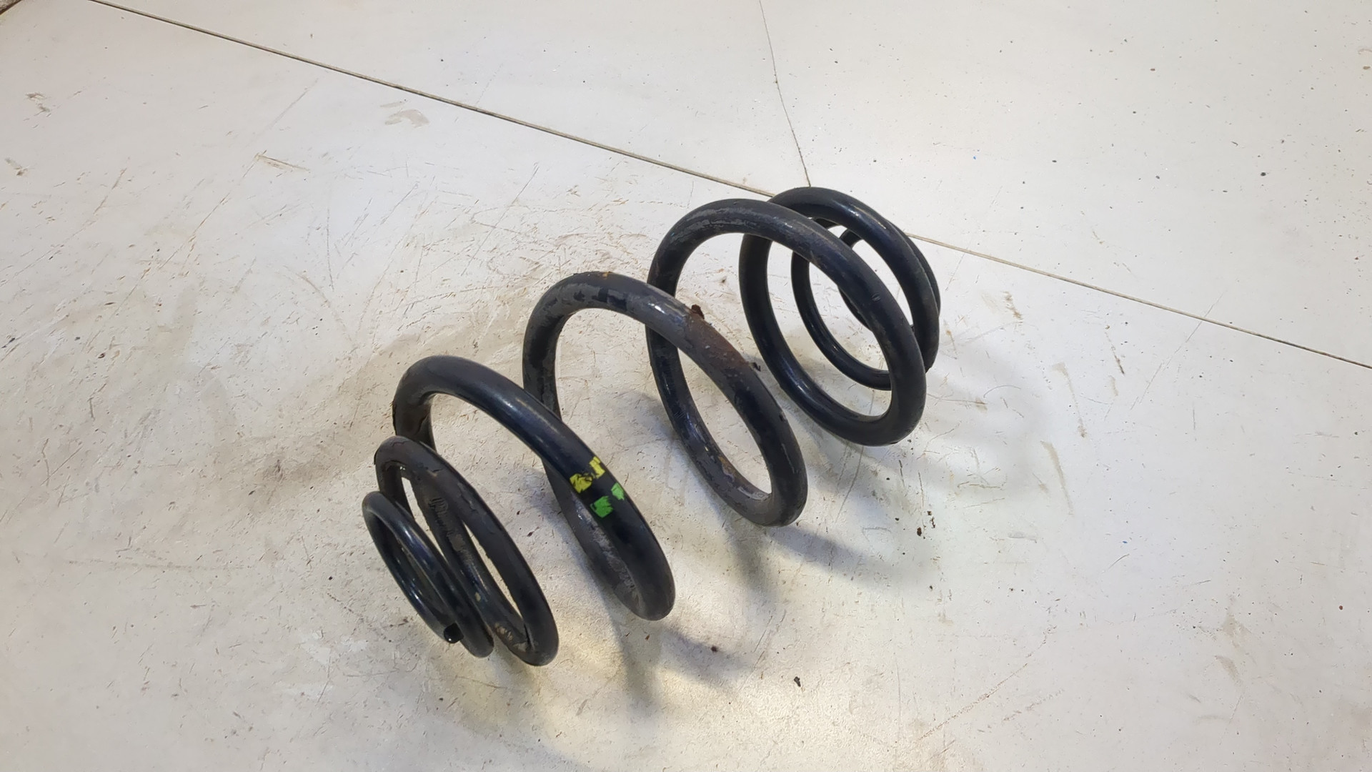Пружина задняя