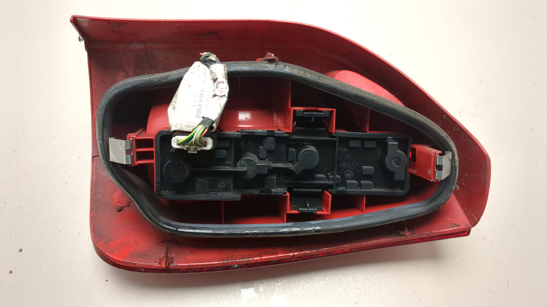 Фонарь задний левый