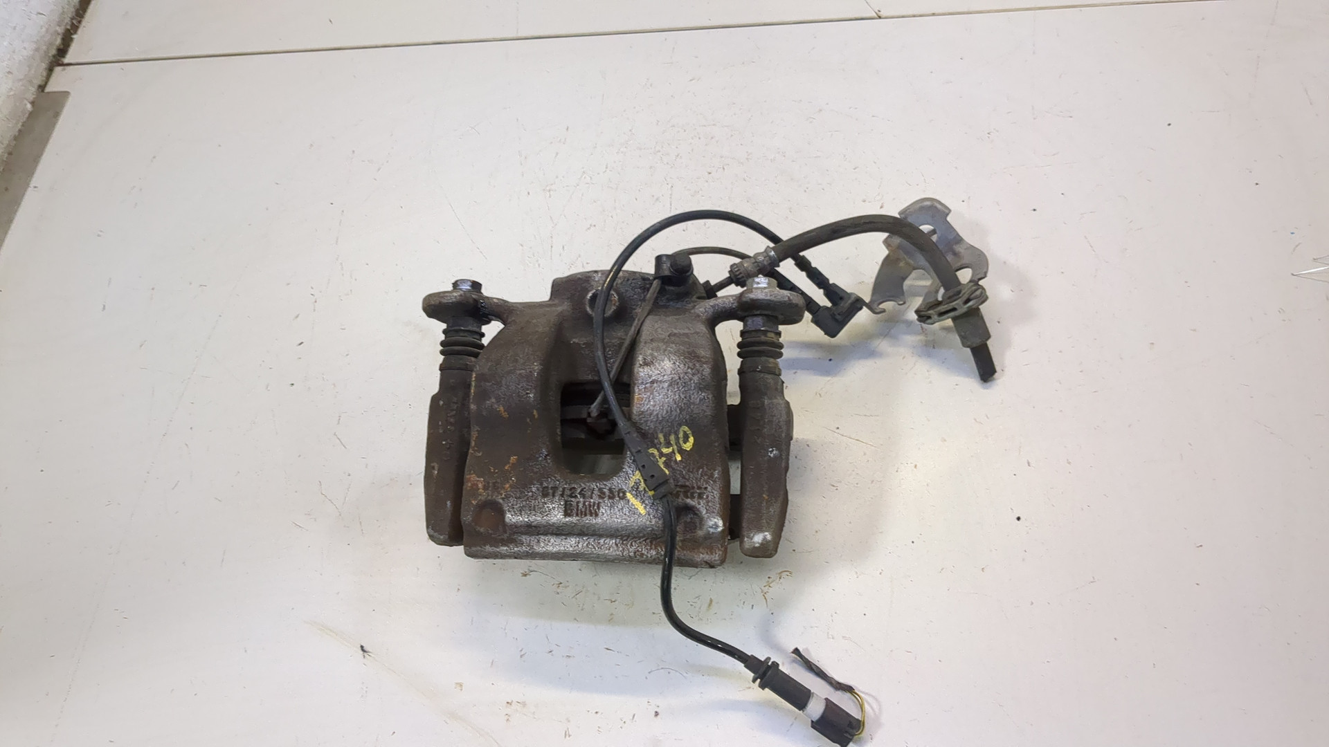 Суппорт передний левый