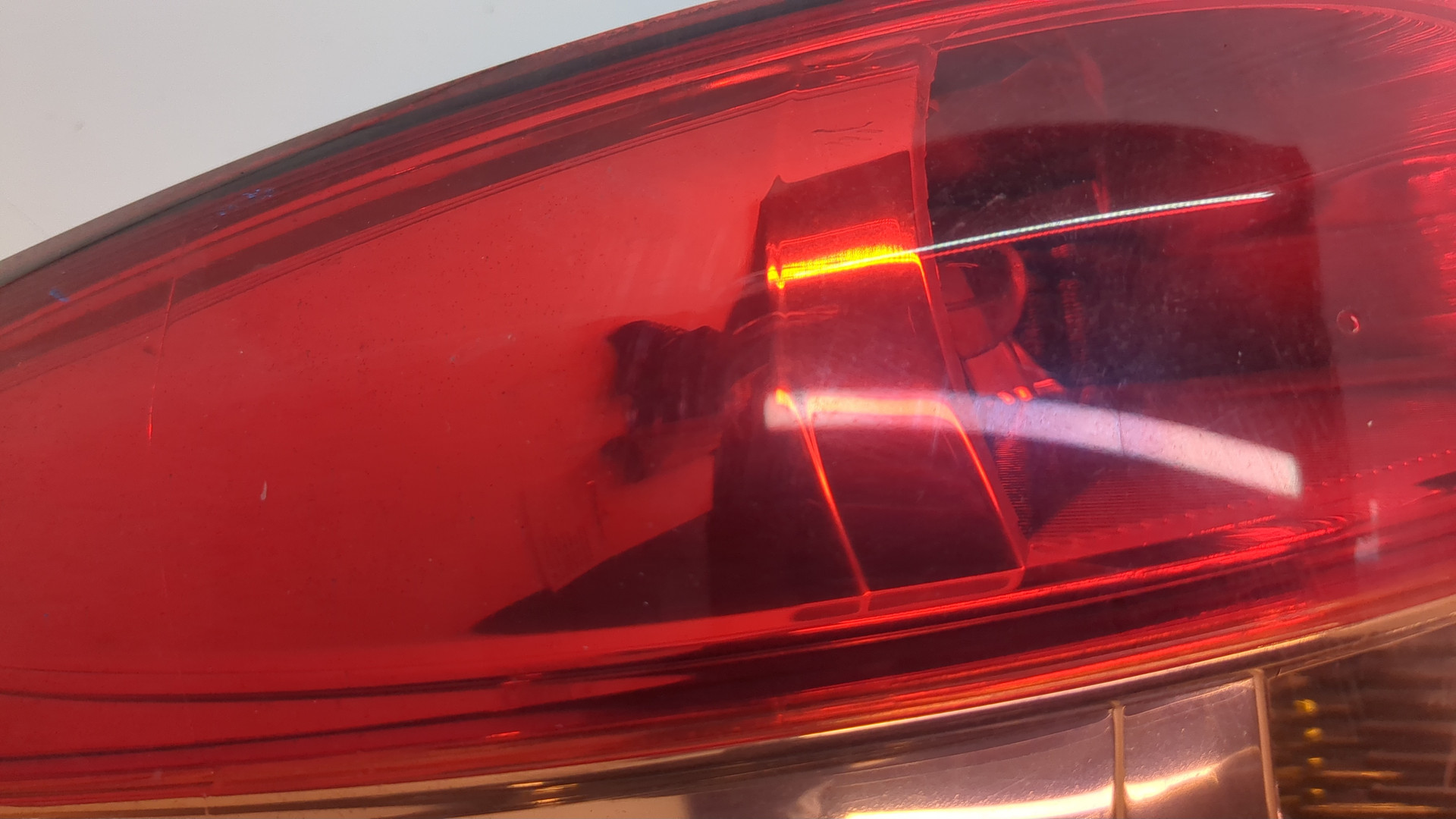 Фонарь задний левый