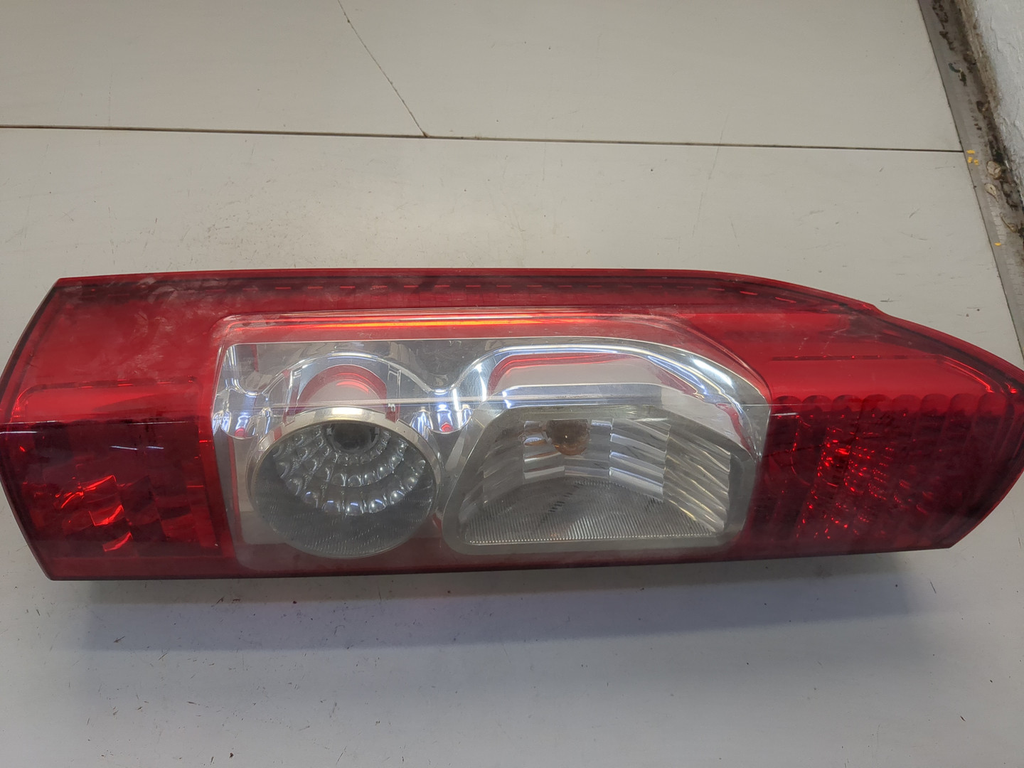 Фонарь задний левый