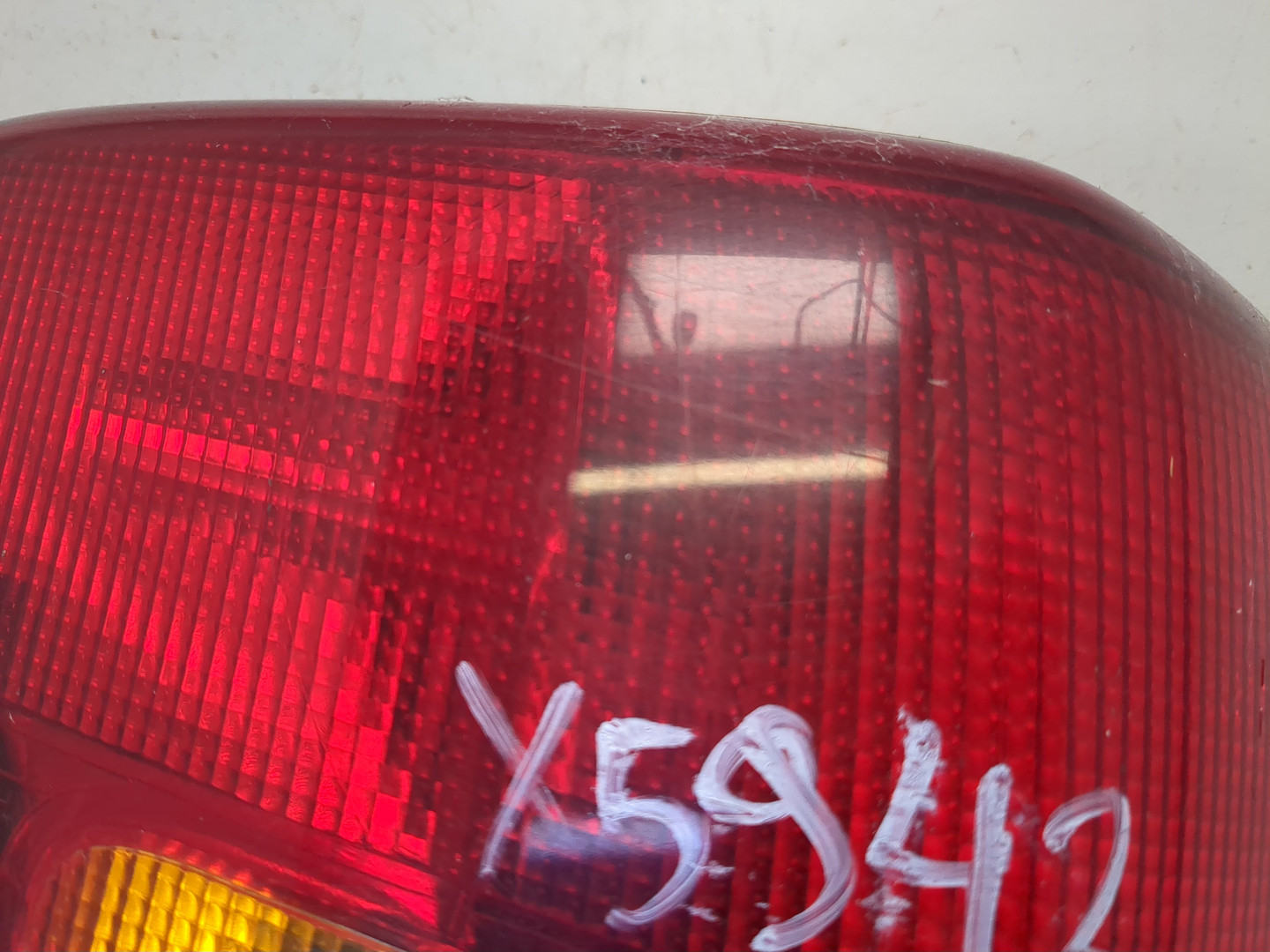 Фонарь задний левый