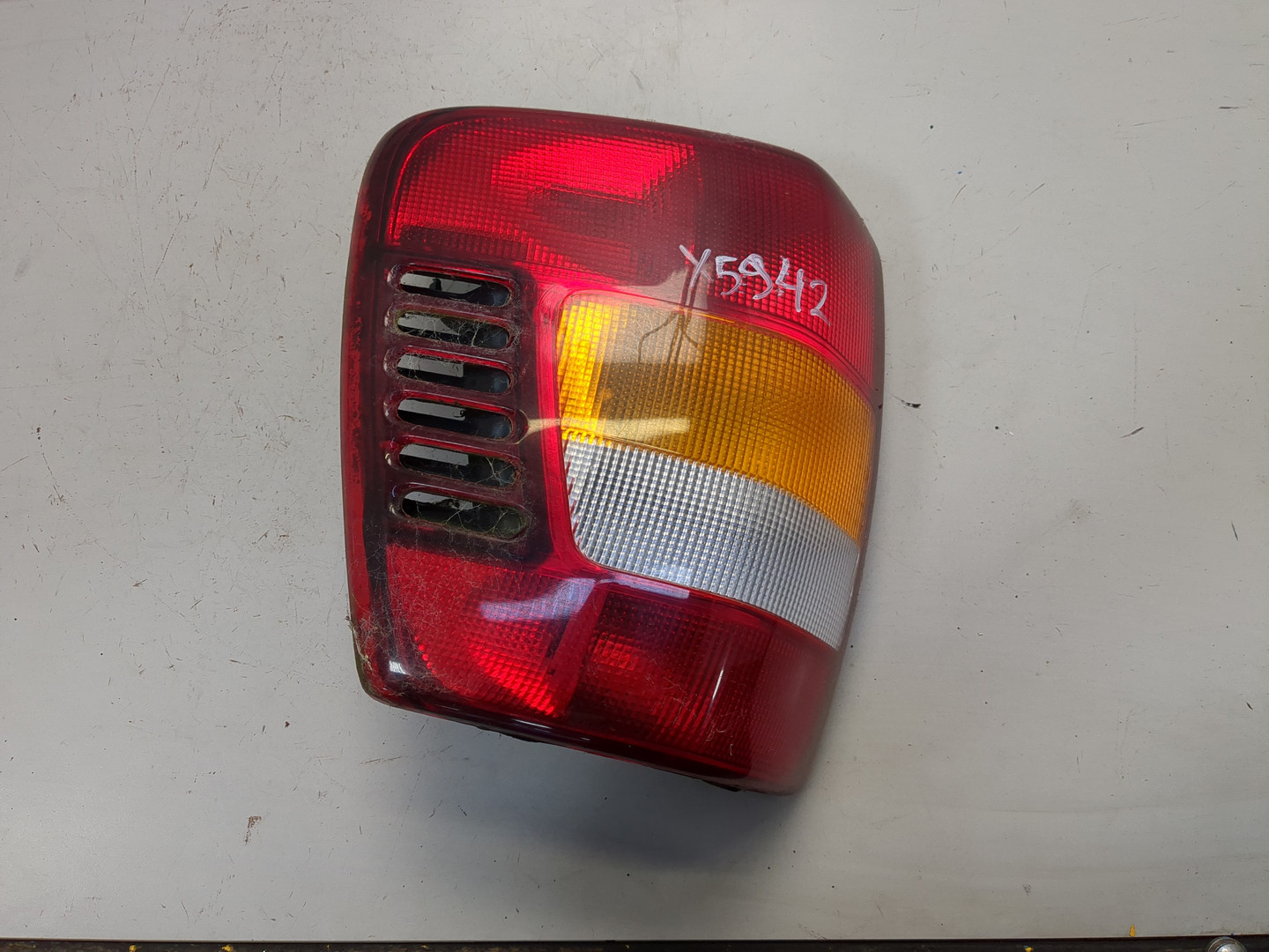 Фонарь задний левый