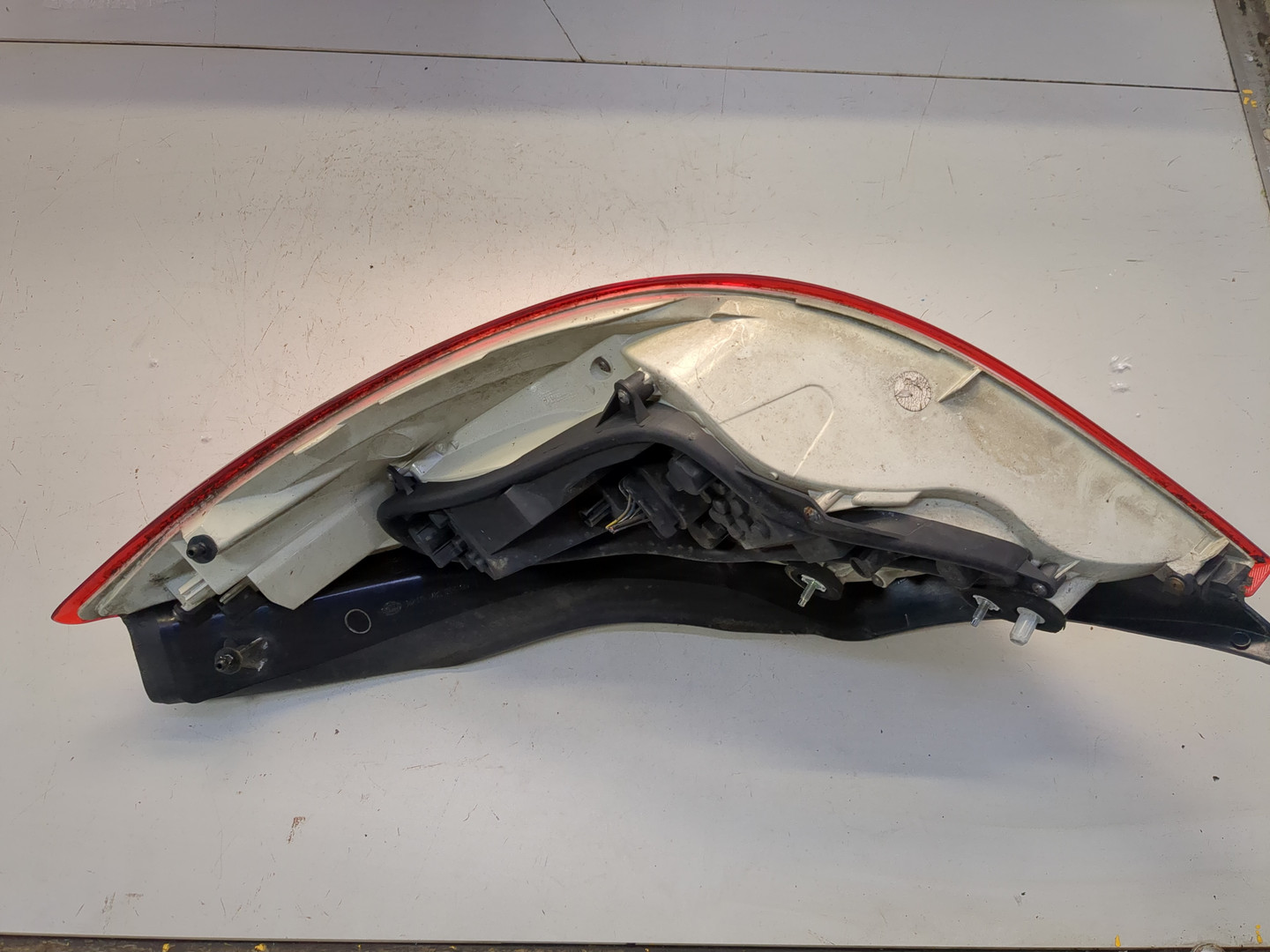 Фонарь задний левый