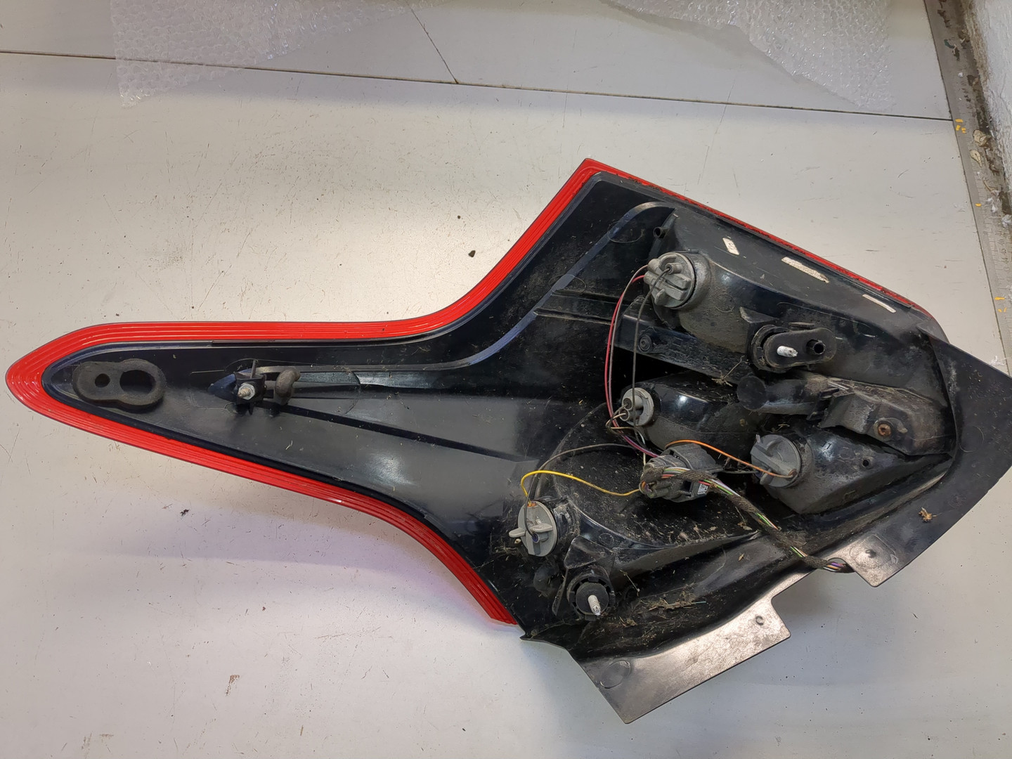 Фонарь задний левый