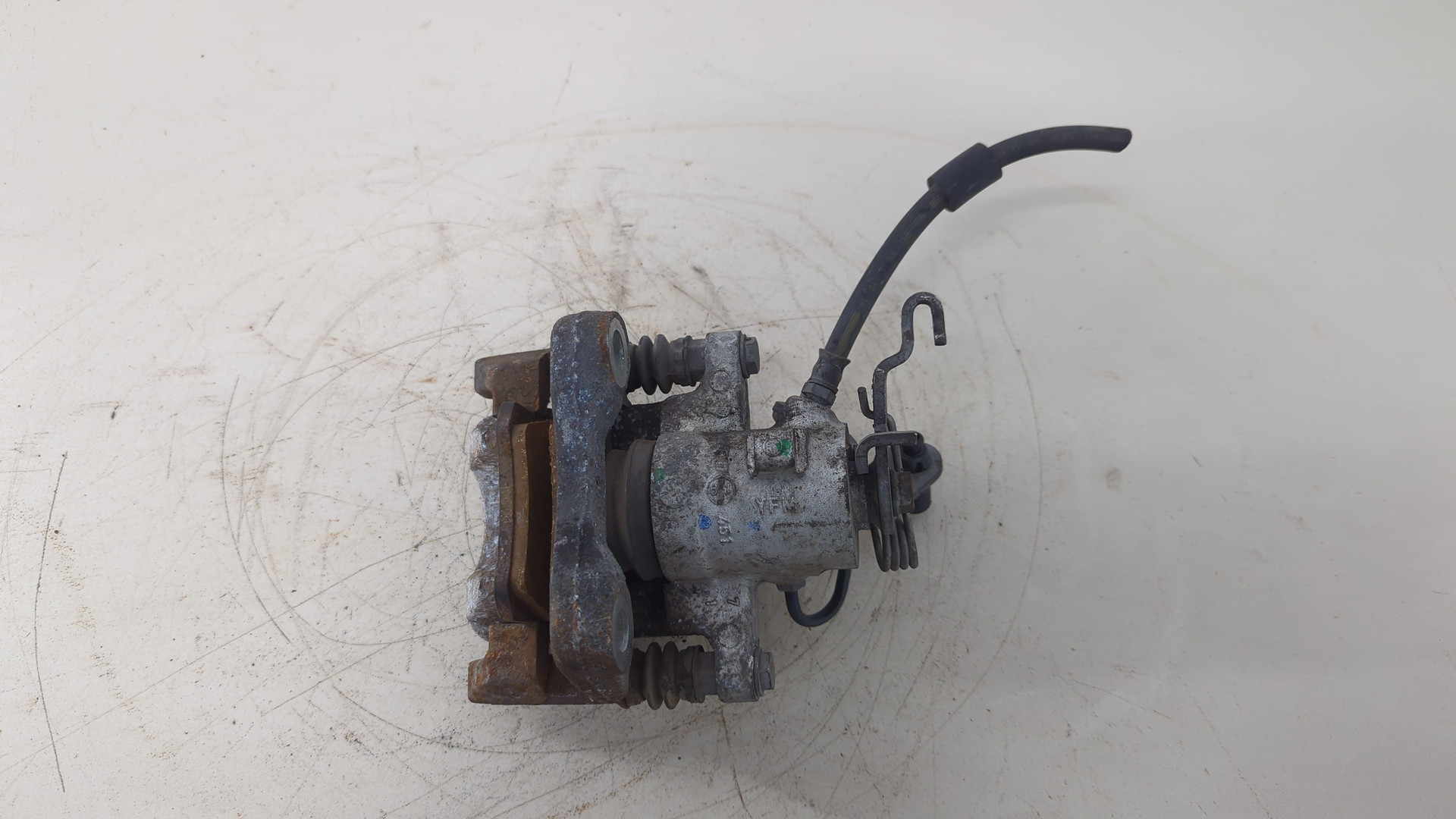 Суппорт задний левый