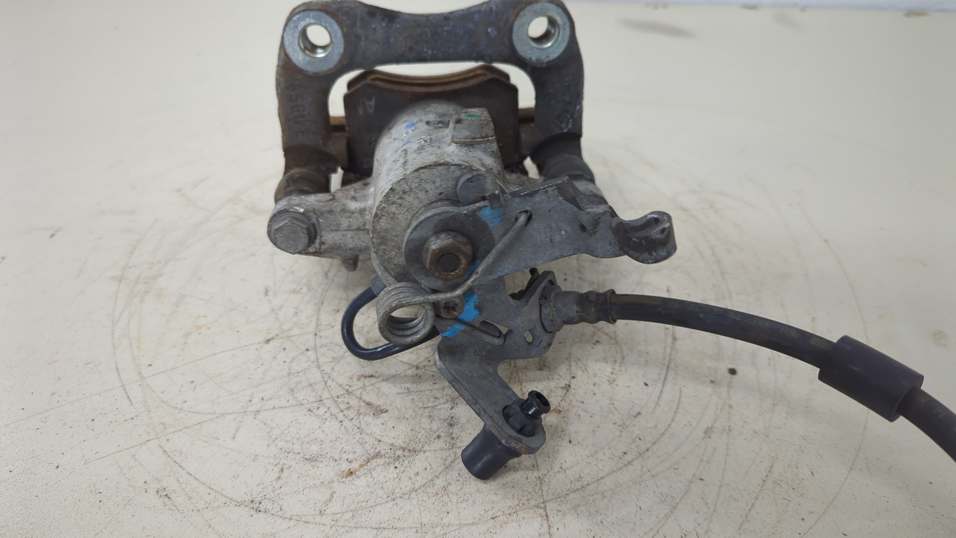 Суппорт задний левый