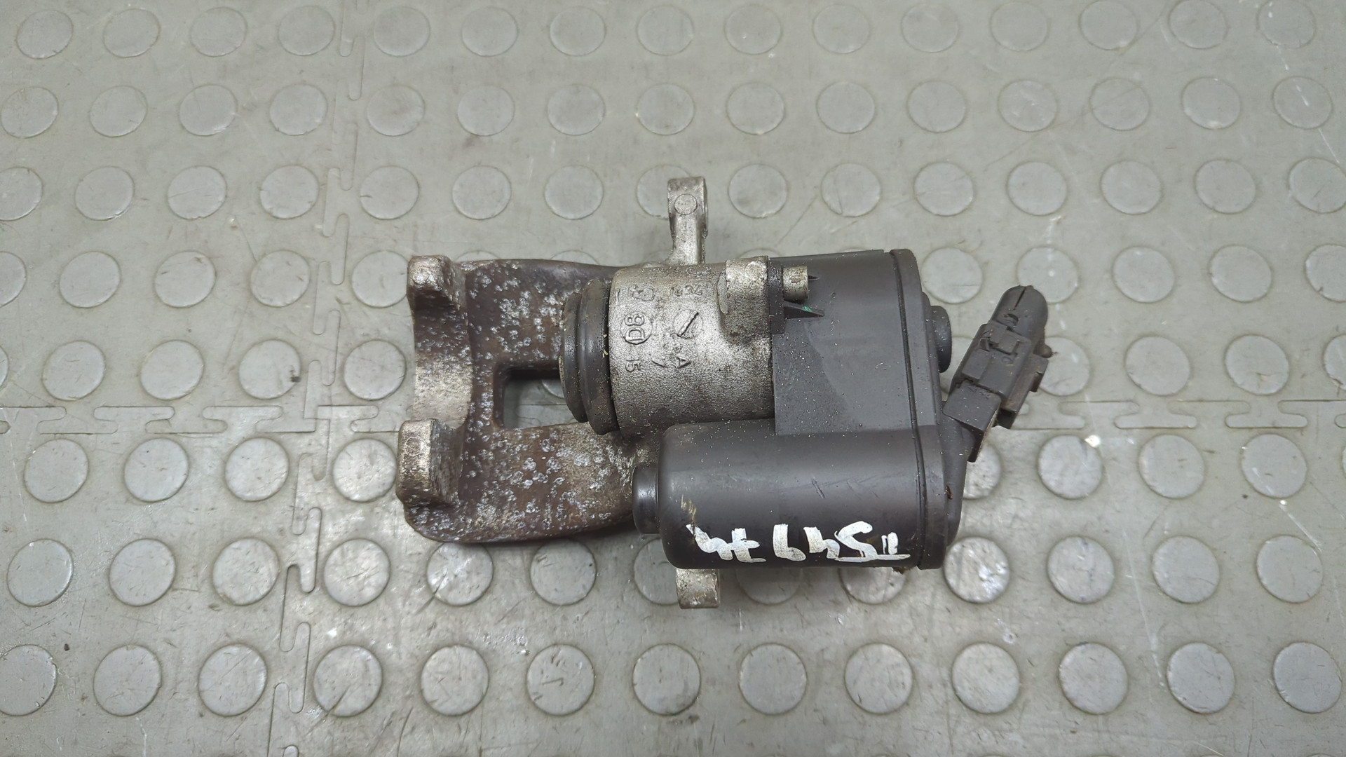 Суппорт задний левый