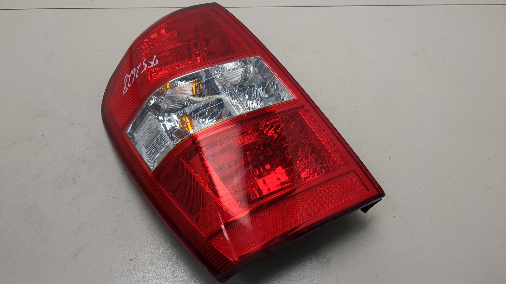 Фонарь задний левый