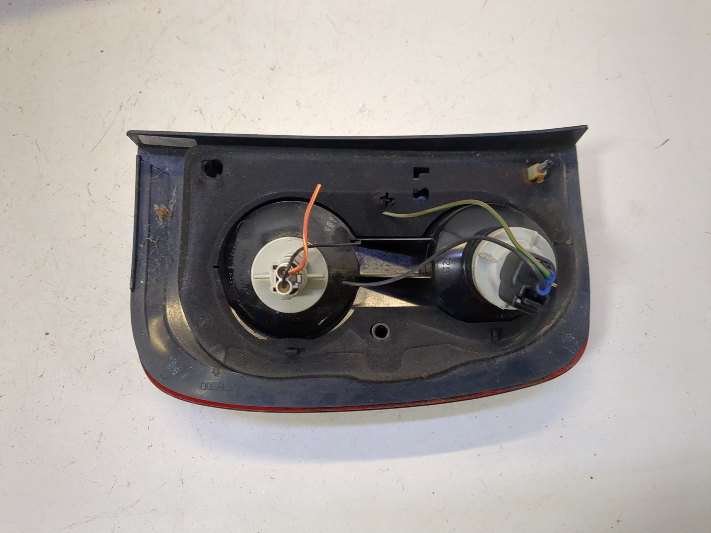 Фонарь задний левый