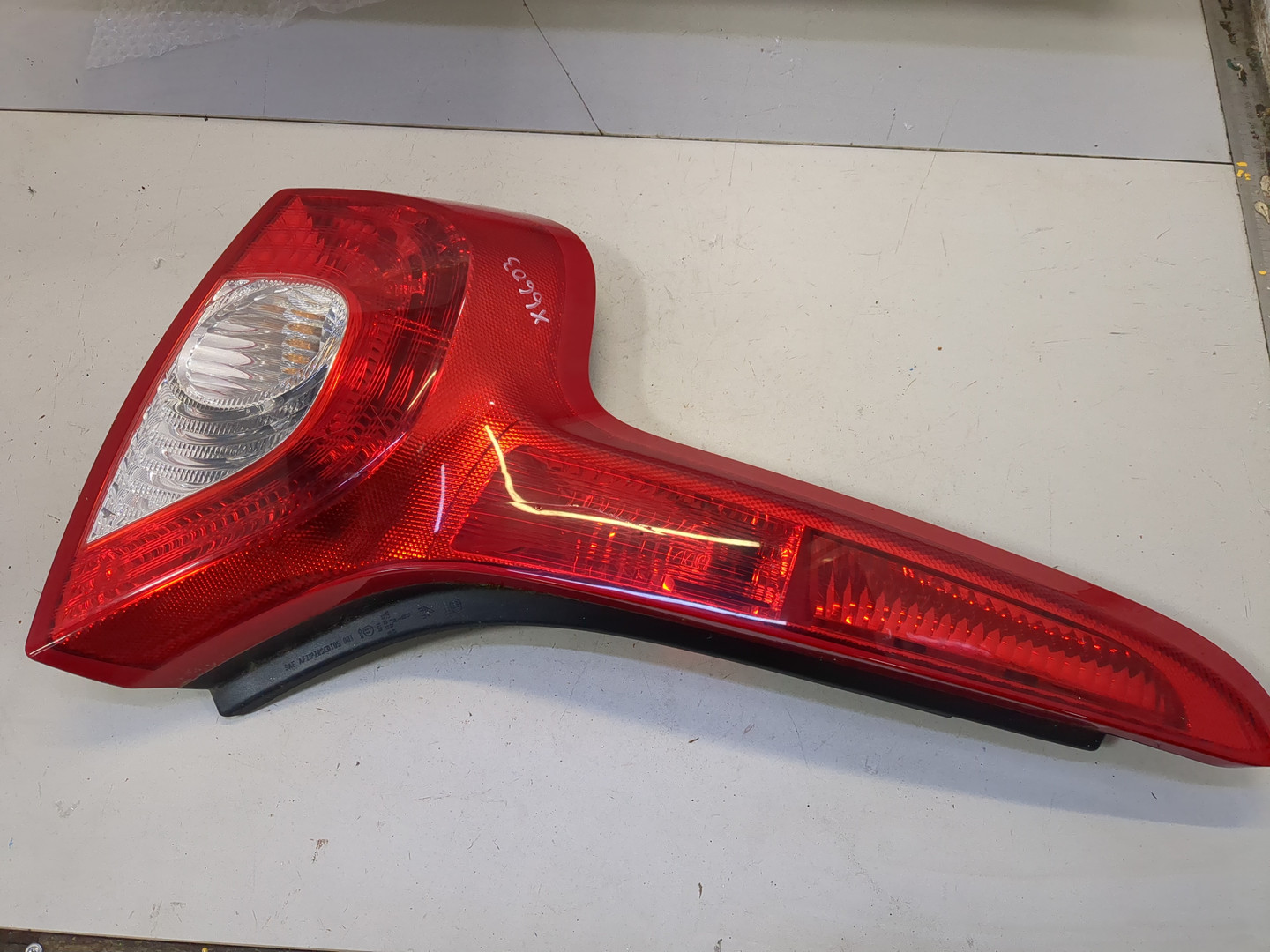 Фонарь задний левый