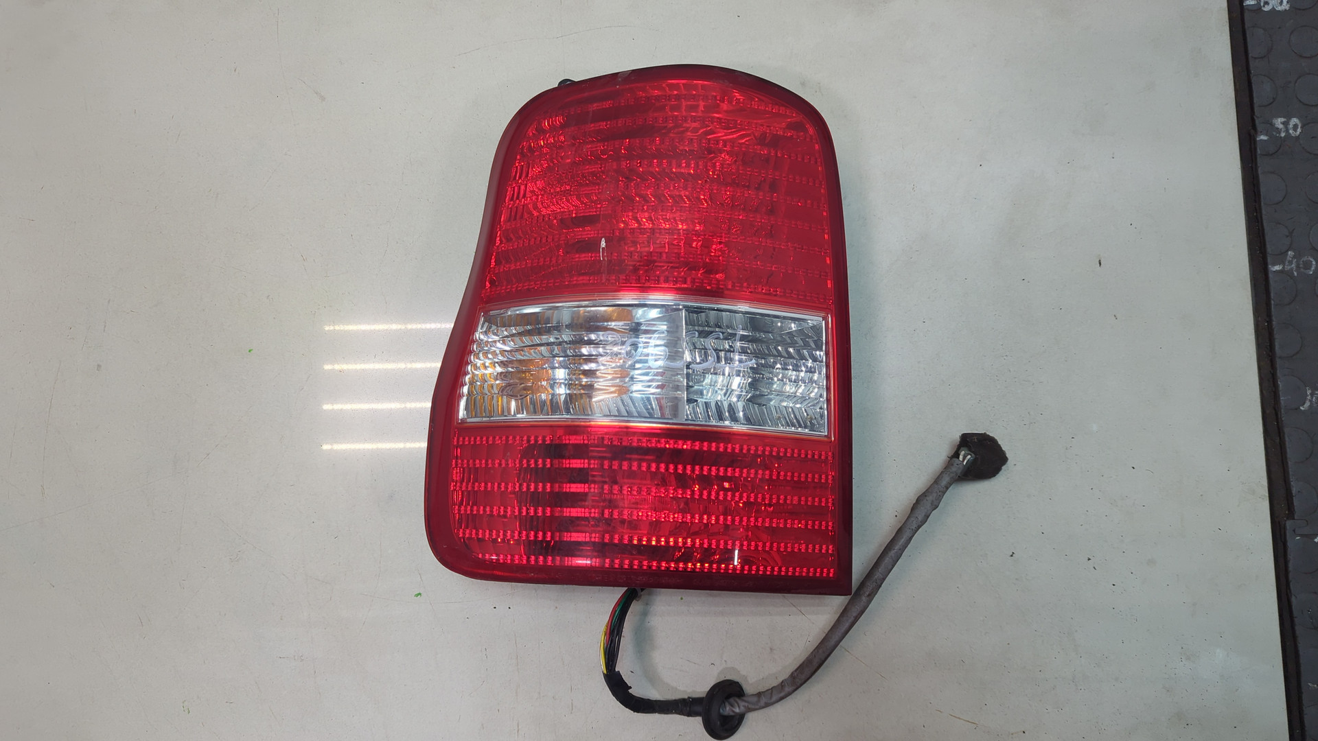 Фонарь задний левый
