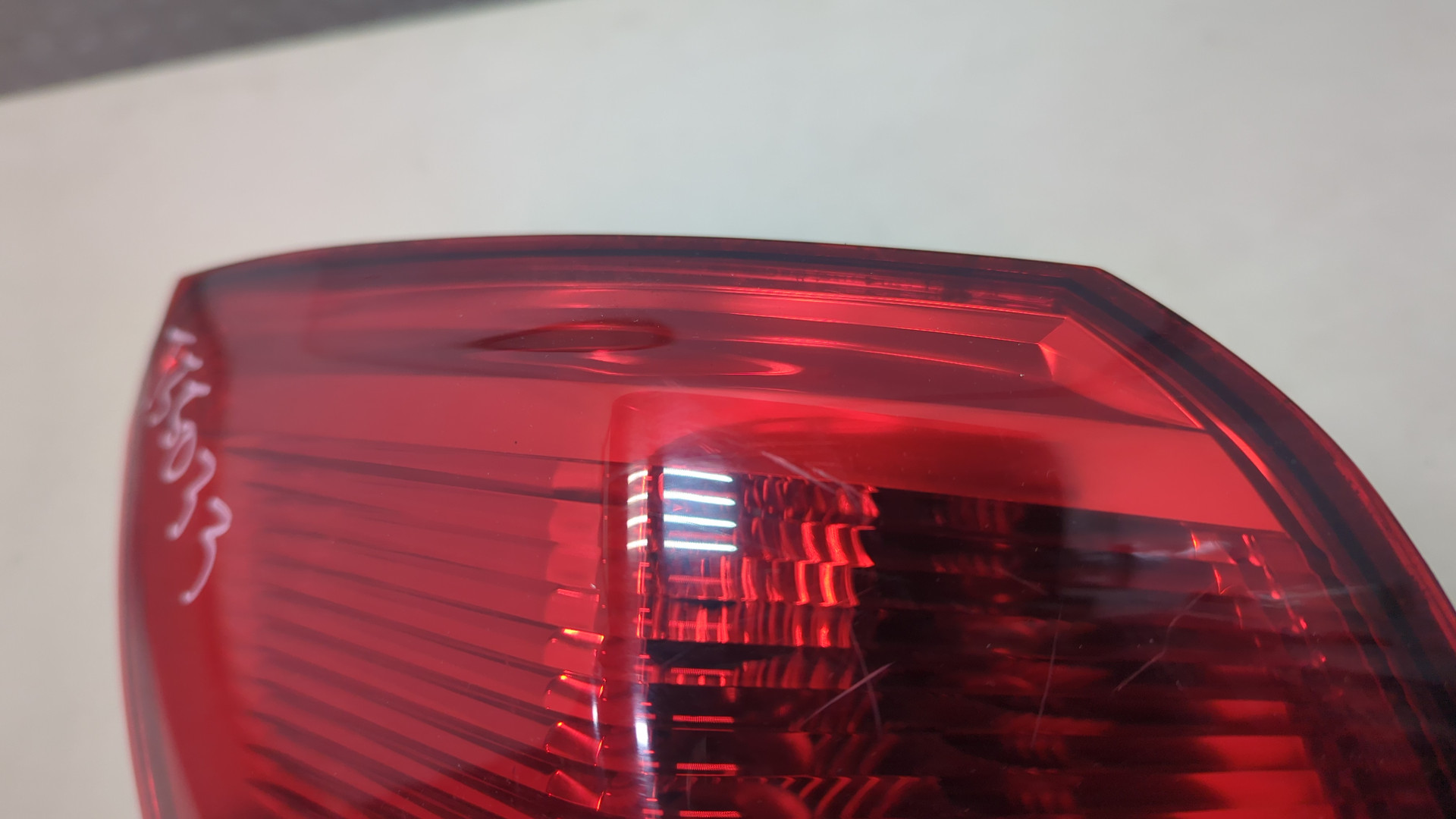 Фонарь задний левый