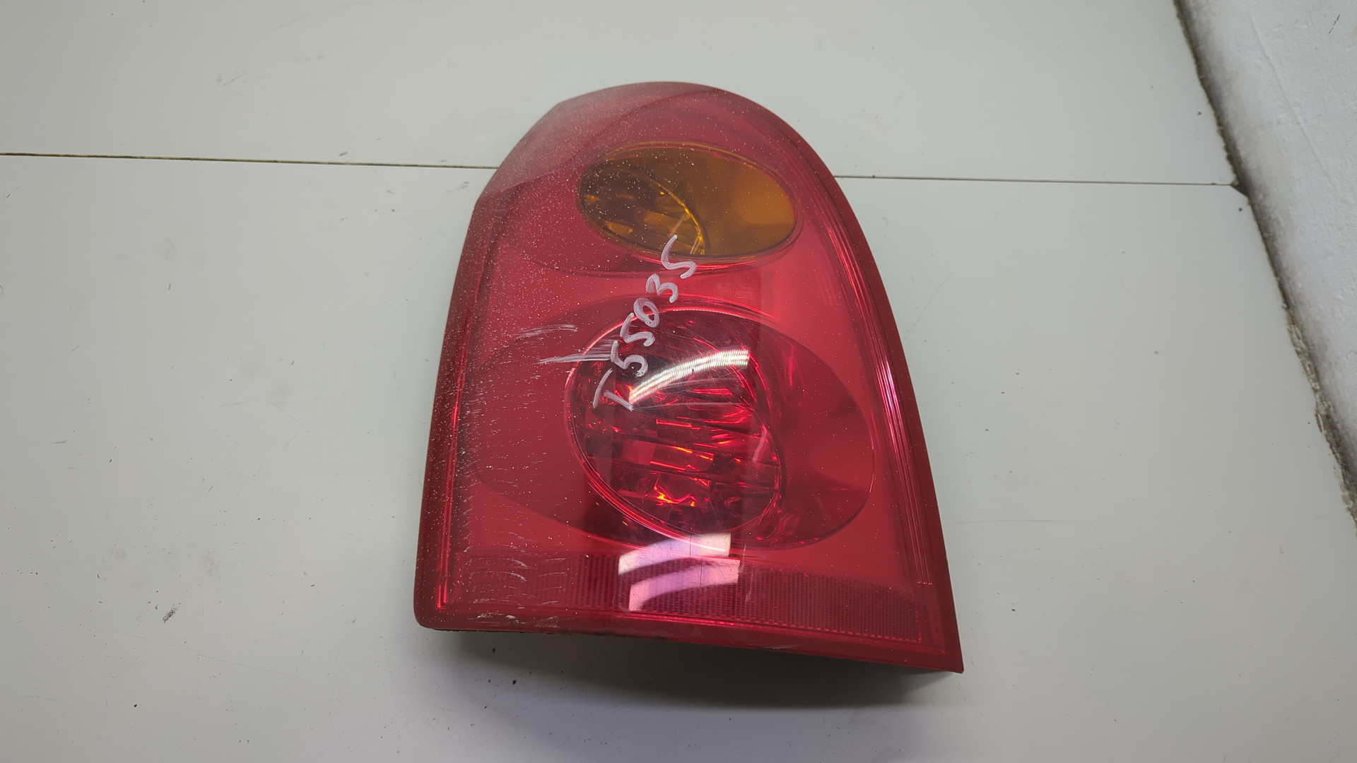 Фонарь задний левый