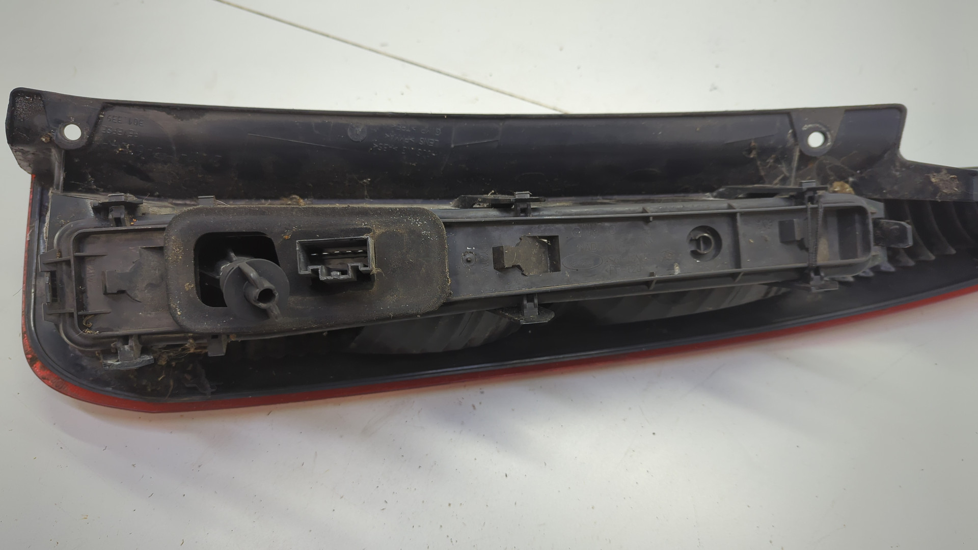 Фонарь задний левый