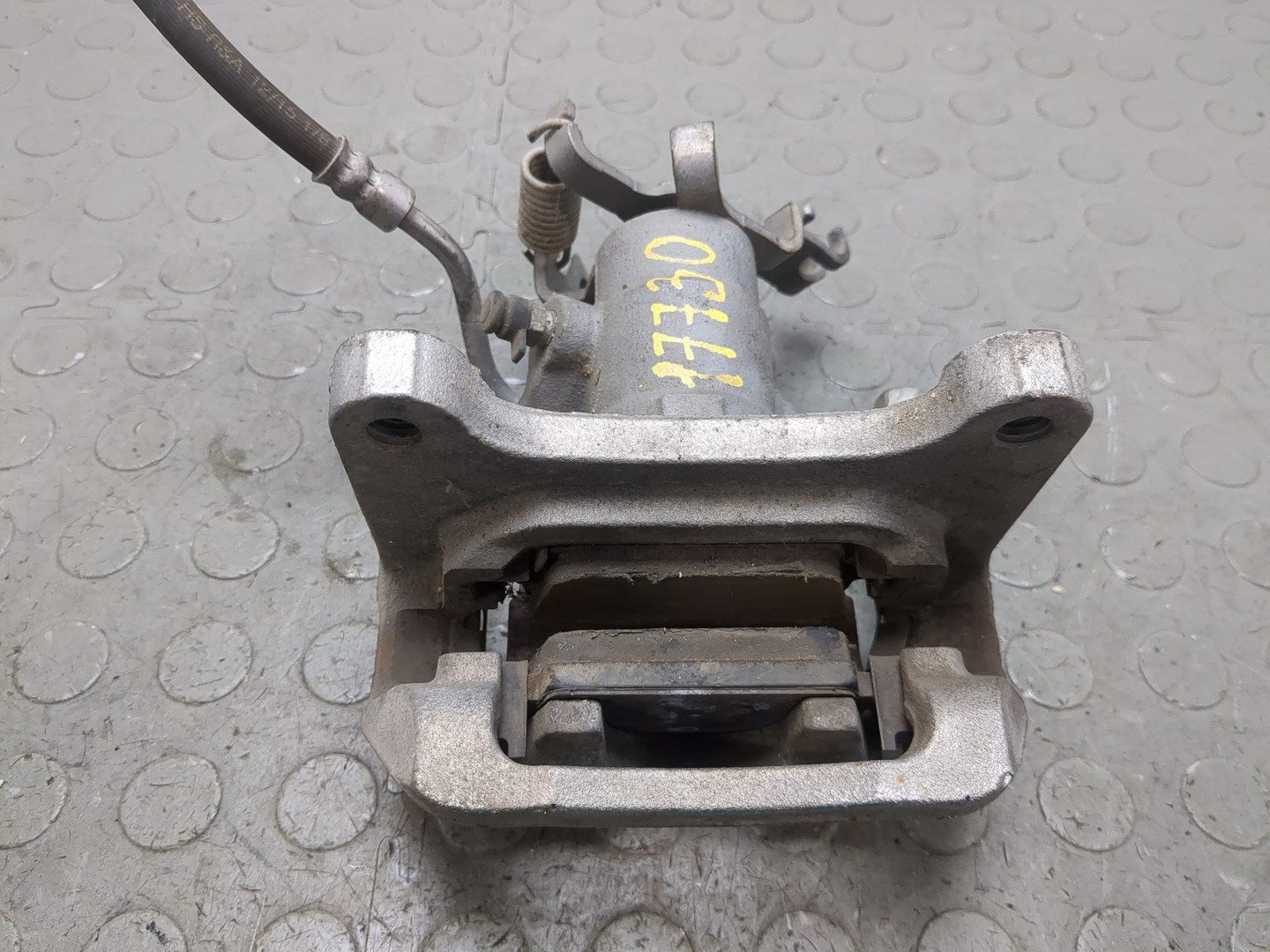 Суппорт задний левый