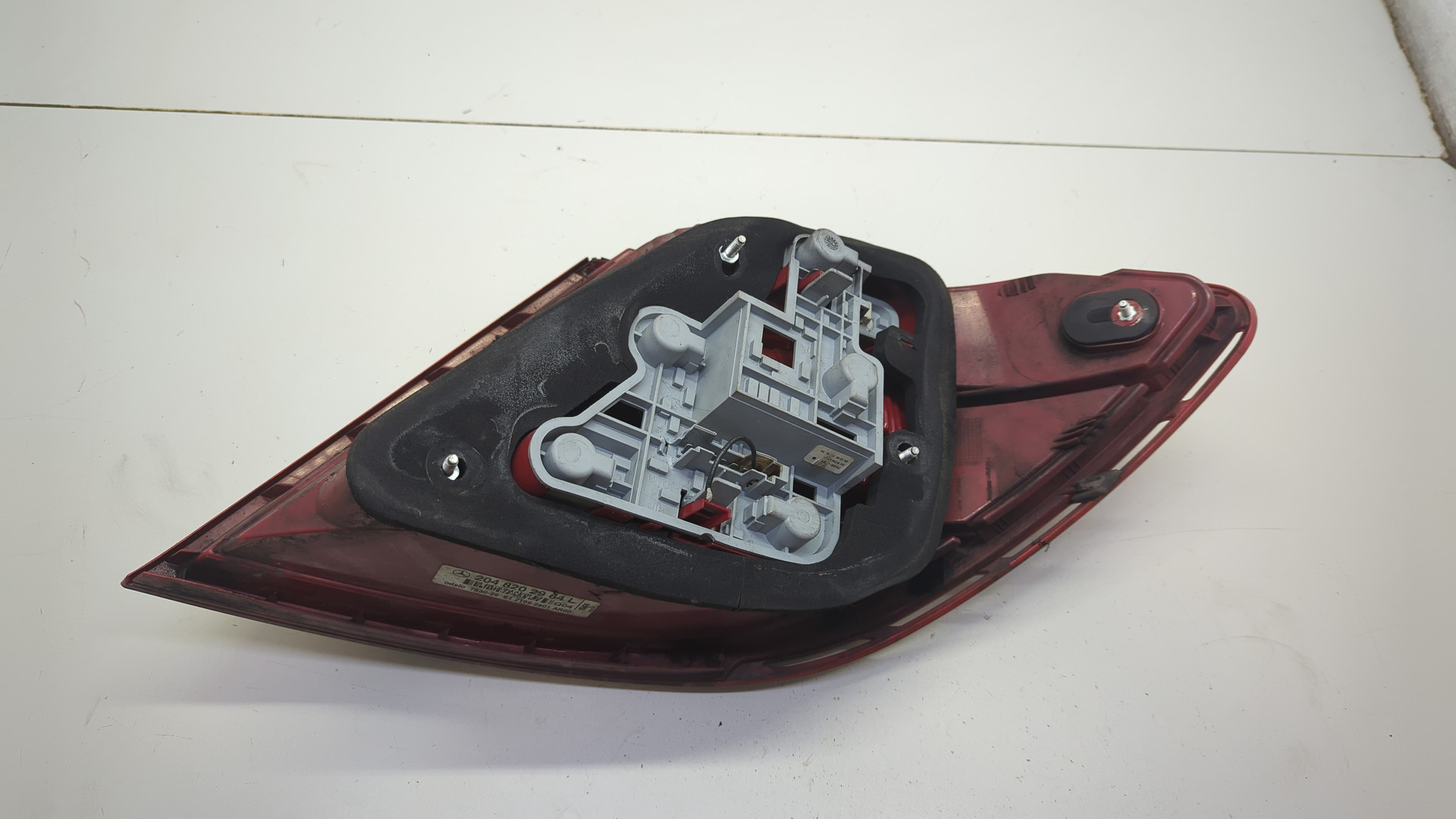 Фонарь задний левый