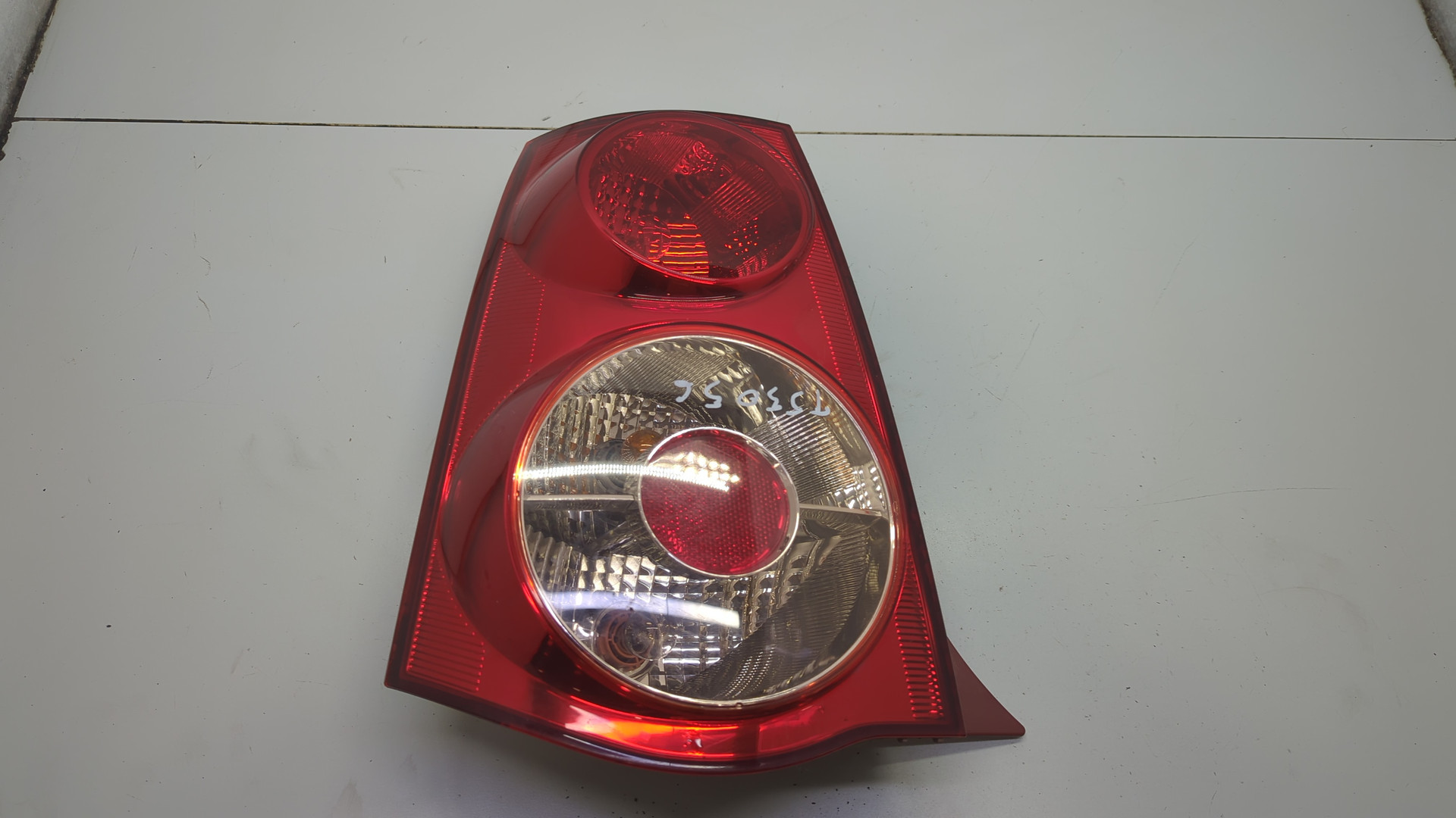 Фонарь задний левый