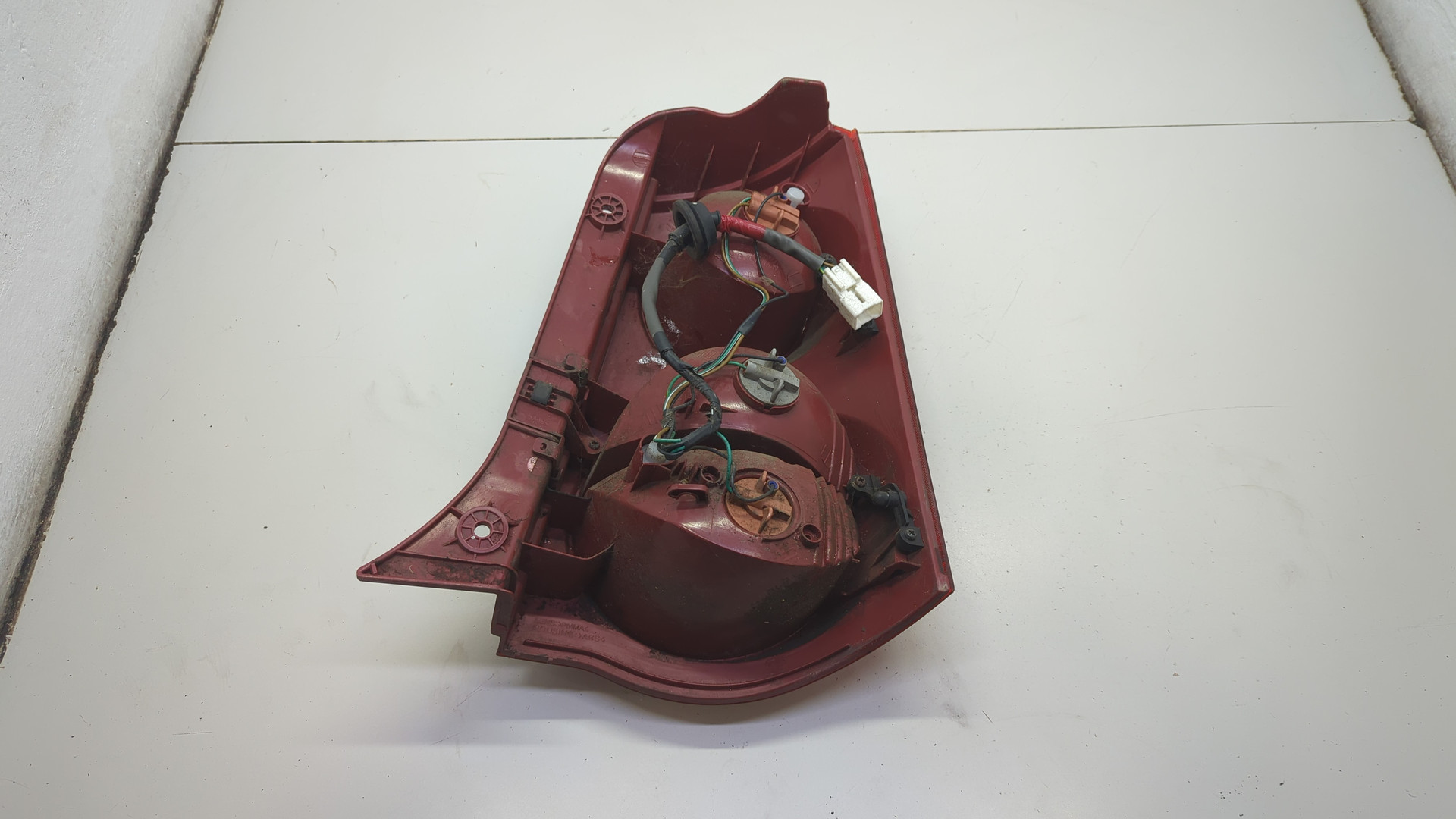 Фонарь задний левый