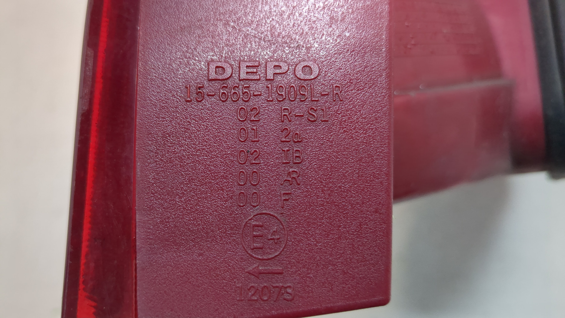 Фонарь задний левый