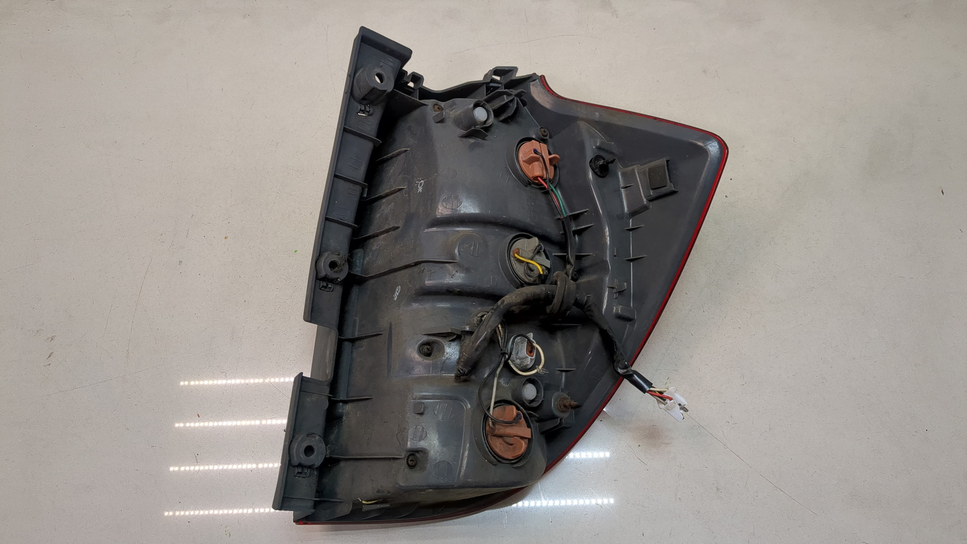 Фонарь задний левый