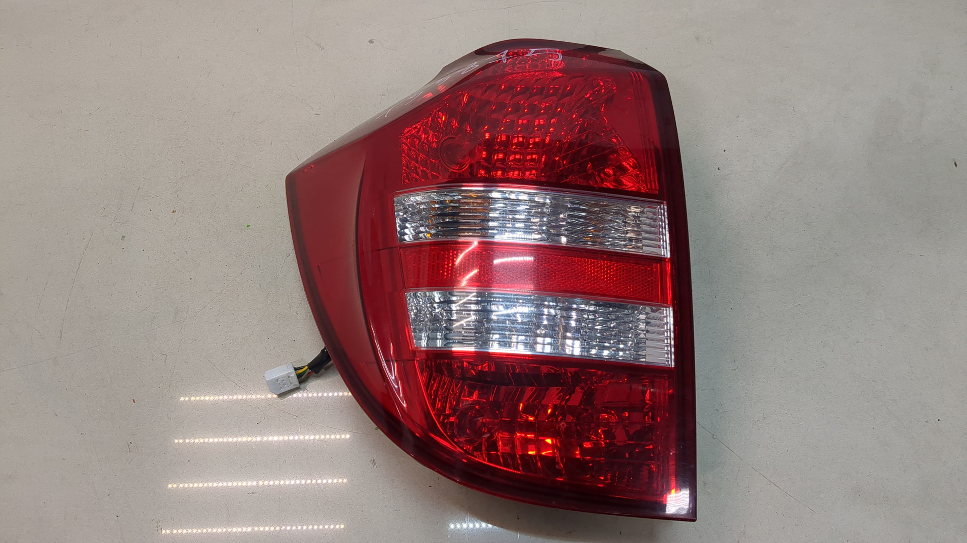 Фонарь задний левый