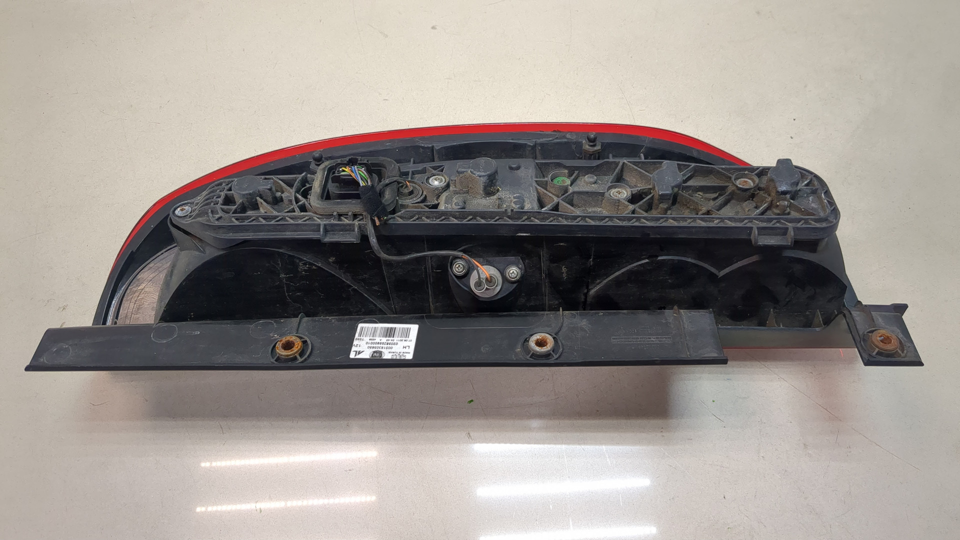 Фонарь задний левый