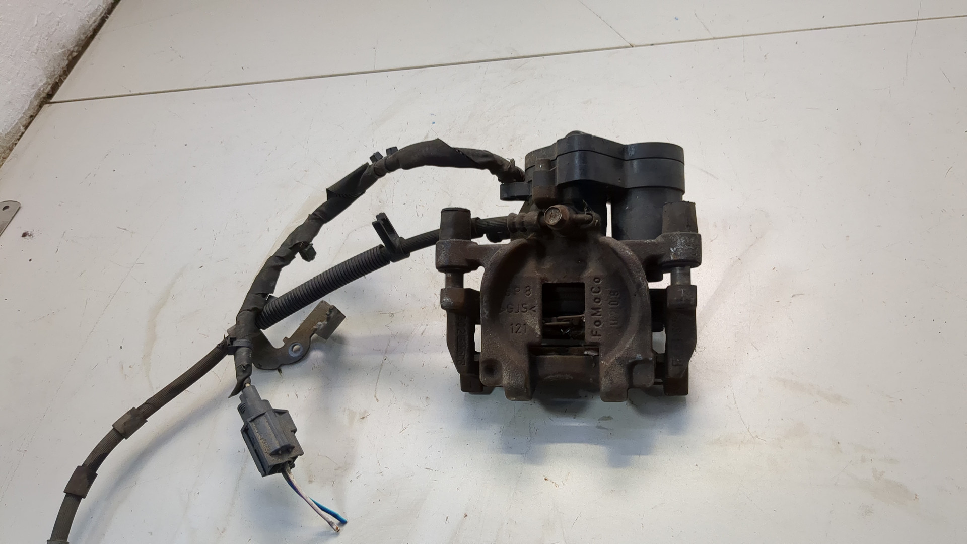 Суппорт задний левый