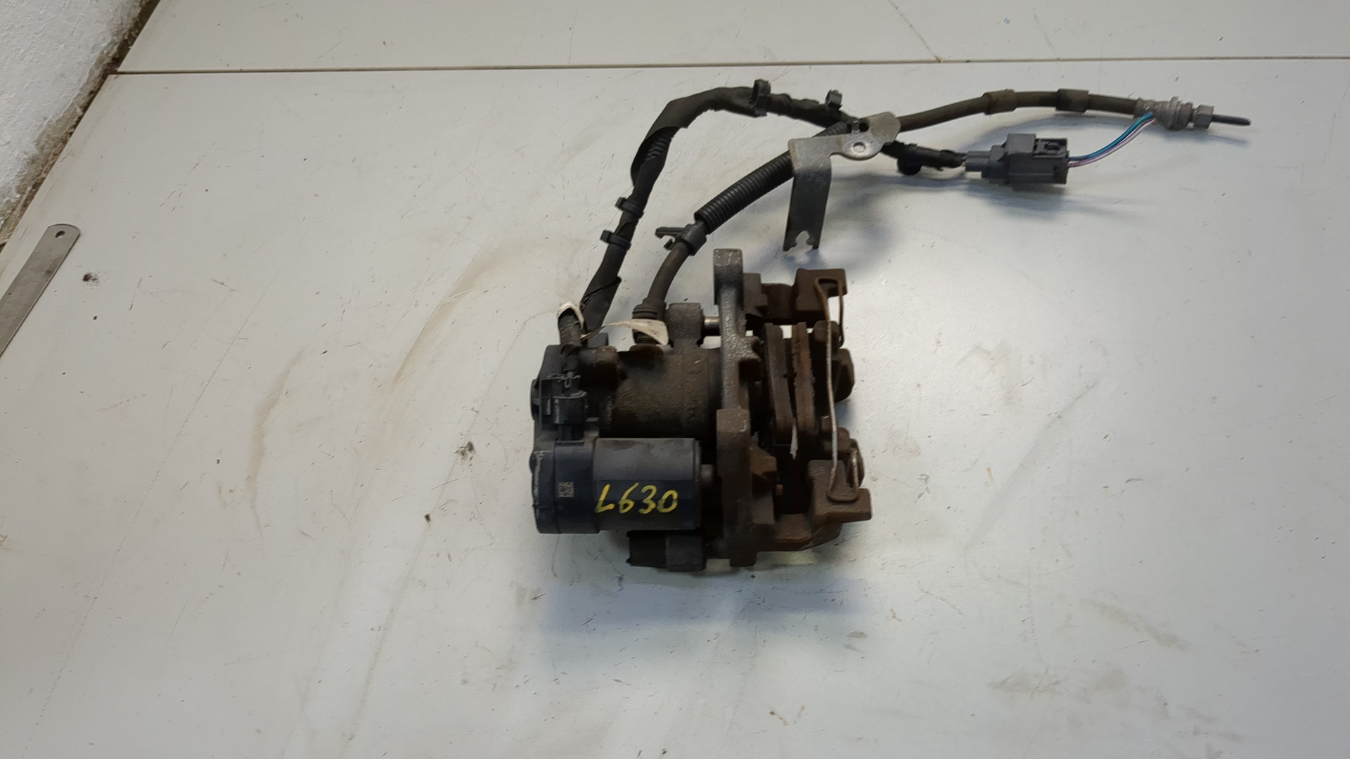 Суппорт задний левый