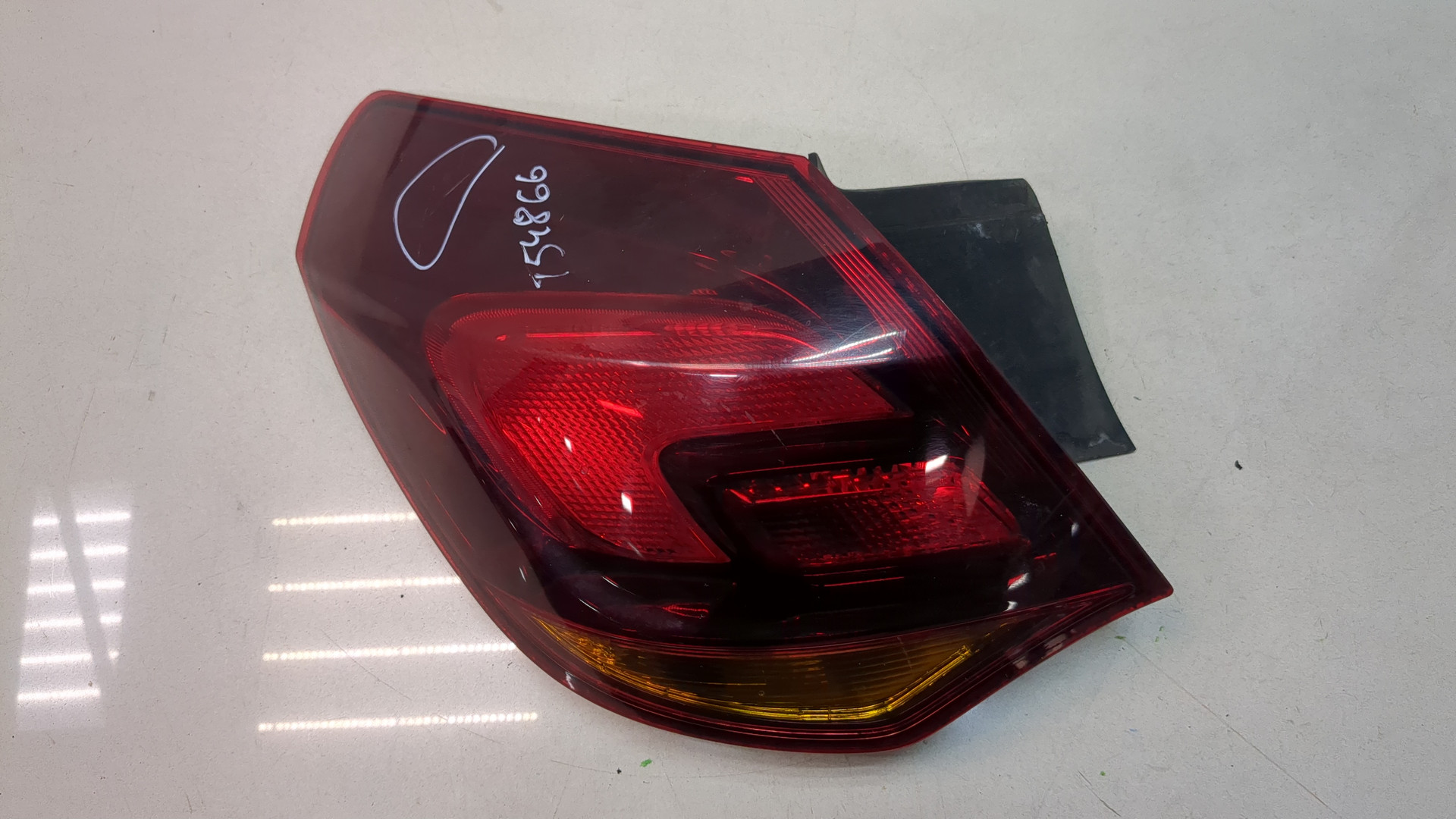 Фонарь задний левый