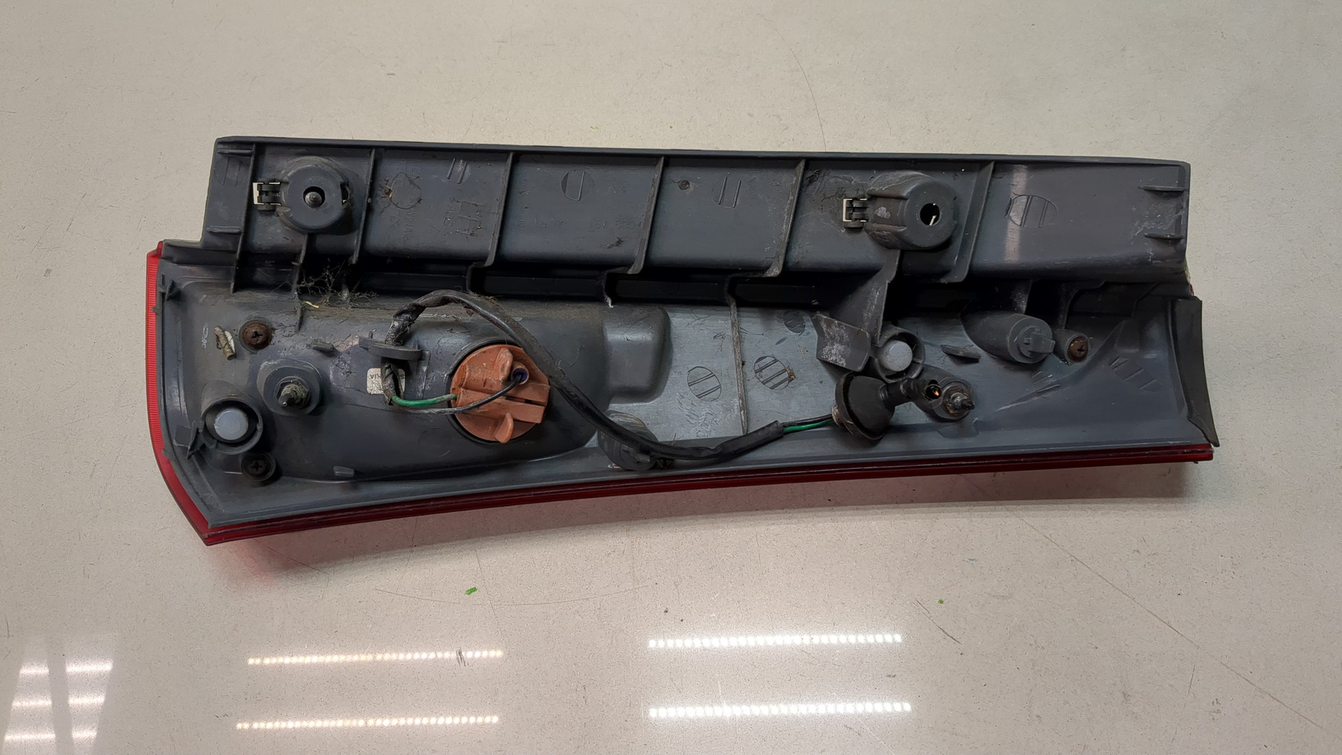 Фонарь задний левый