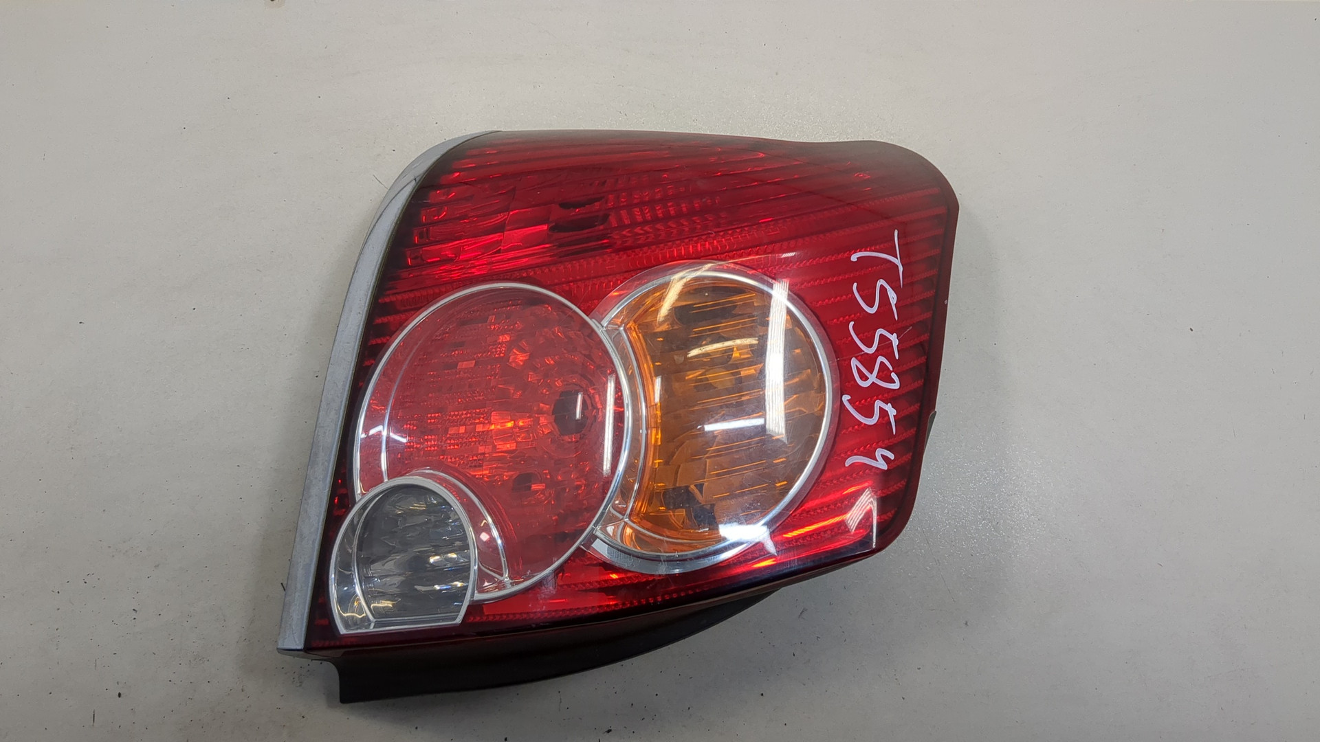 Фонарь задний левый