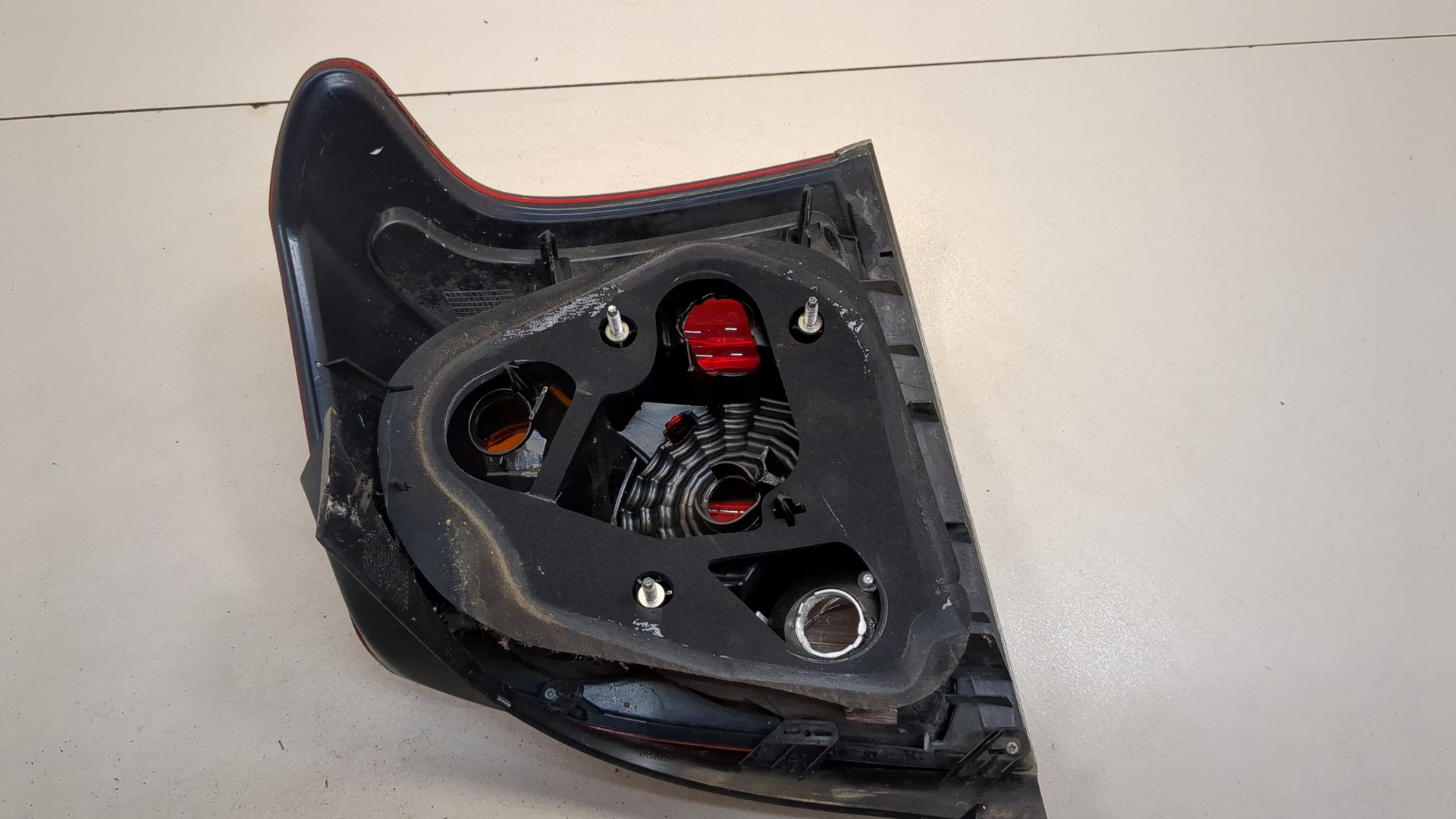 Фонарь задний левый