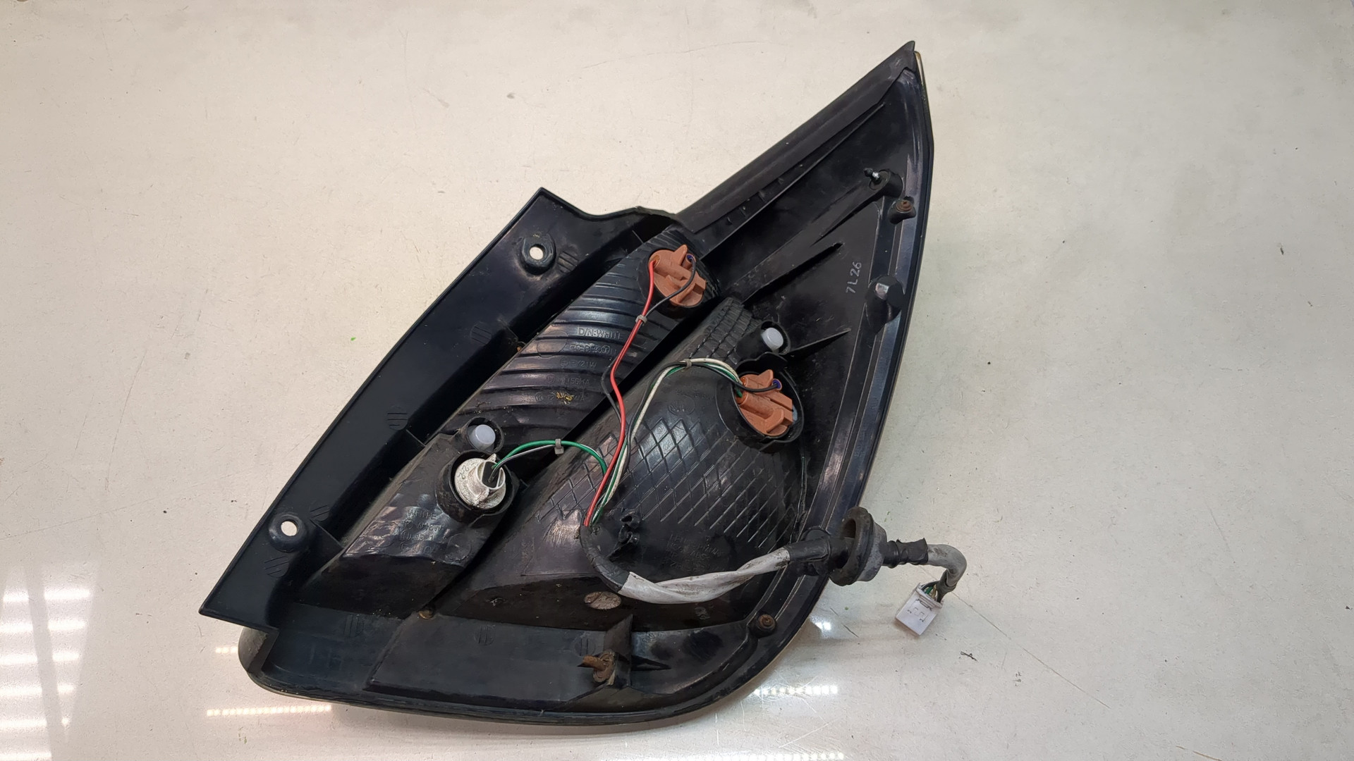 Фонарь задний левый