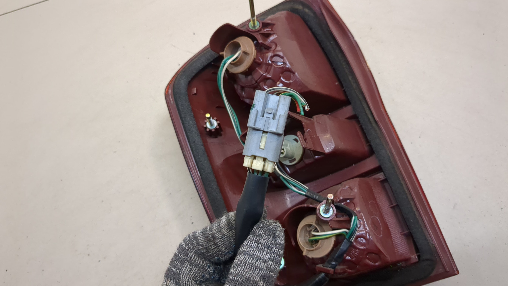 Фонарь задний левый