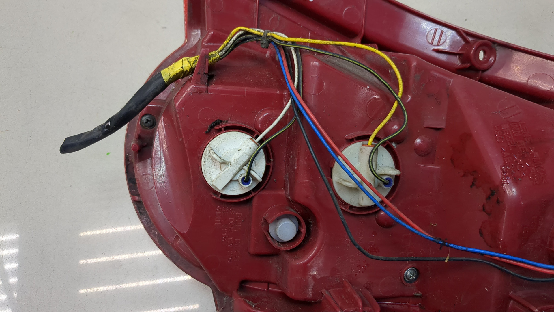 Фонарь задний левый