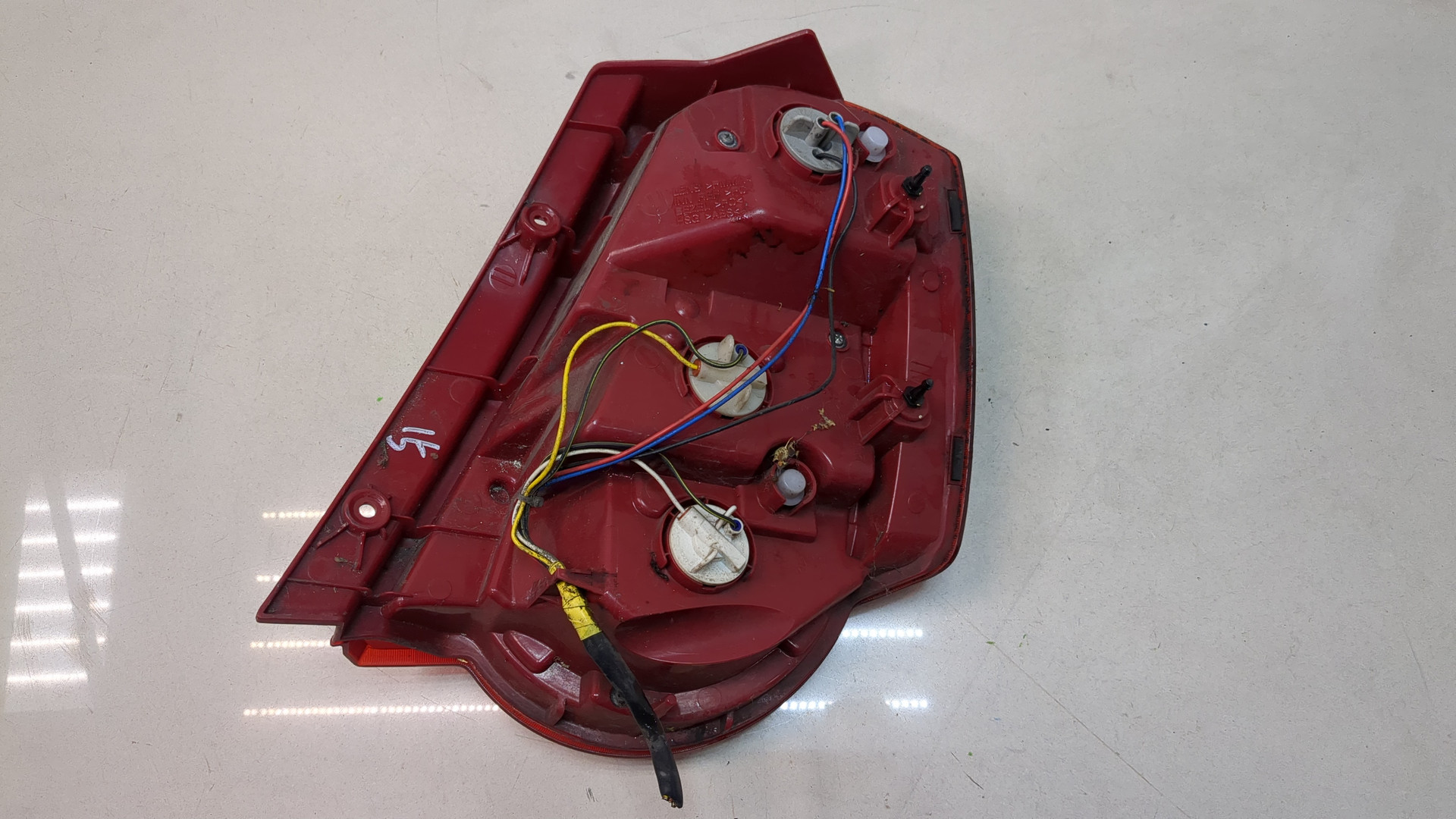 Фонарь задний левый