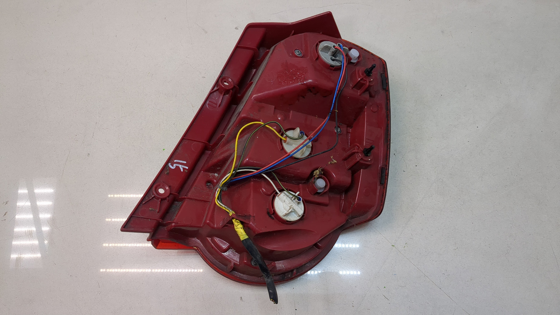 Фонарь задний левый