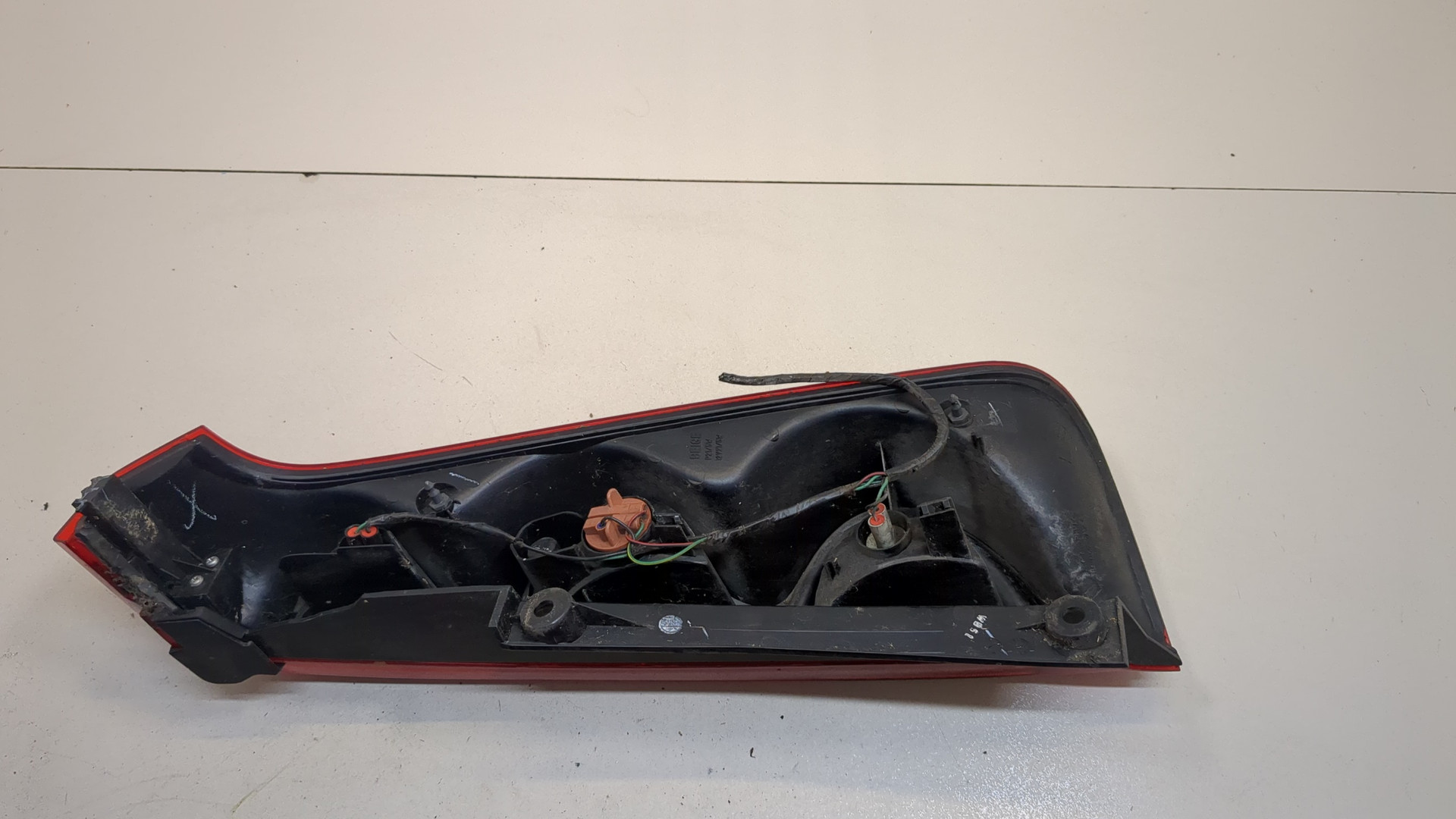 Фонарь задний левый