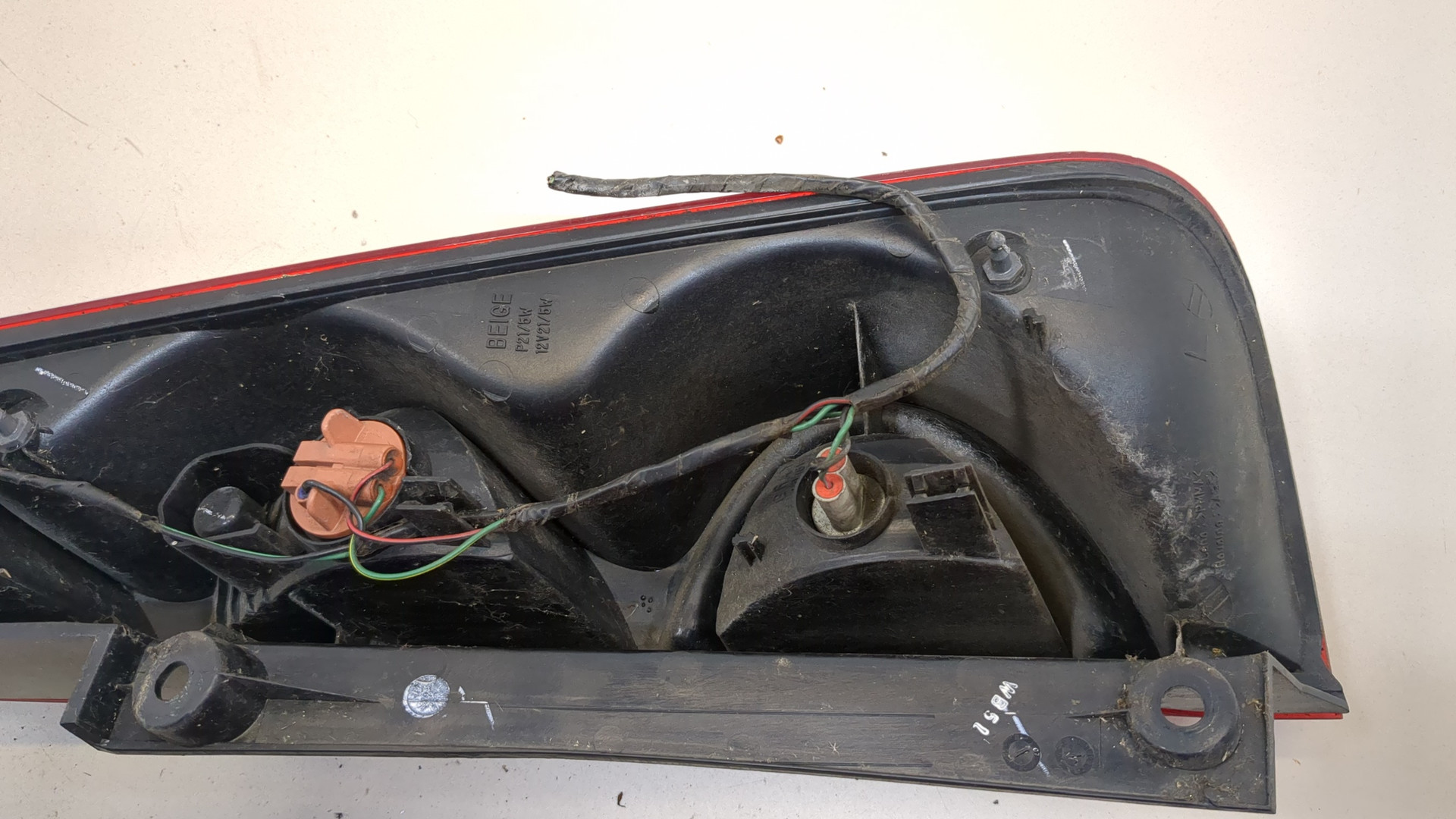 Фонарь задний левый