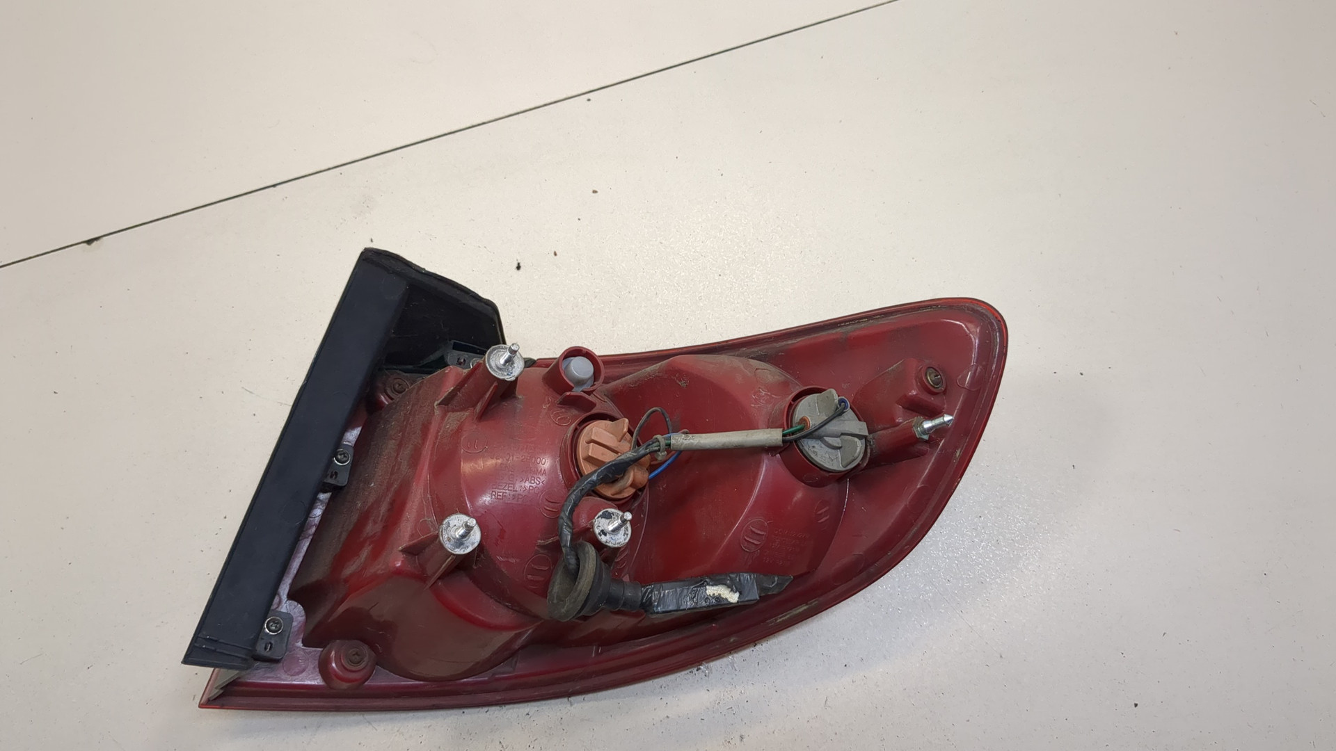 Фонарь задний левый