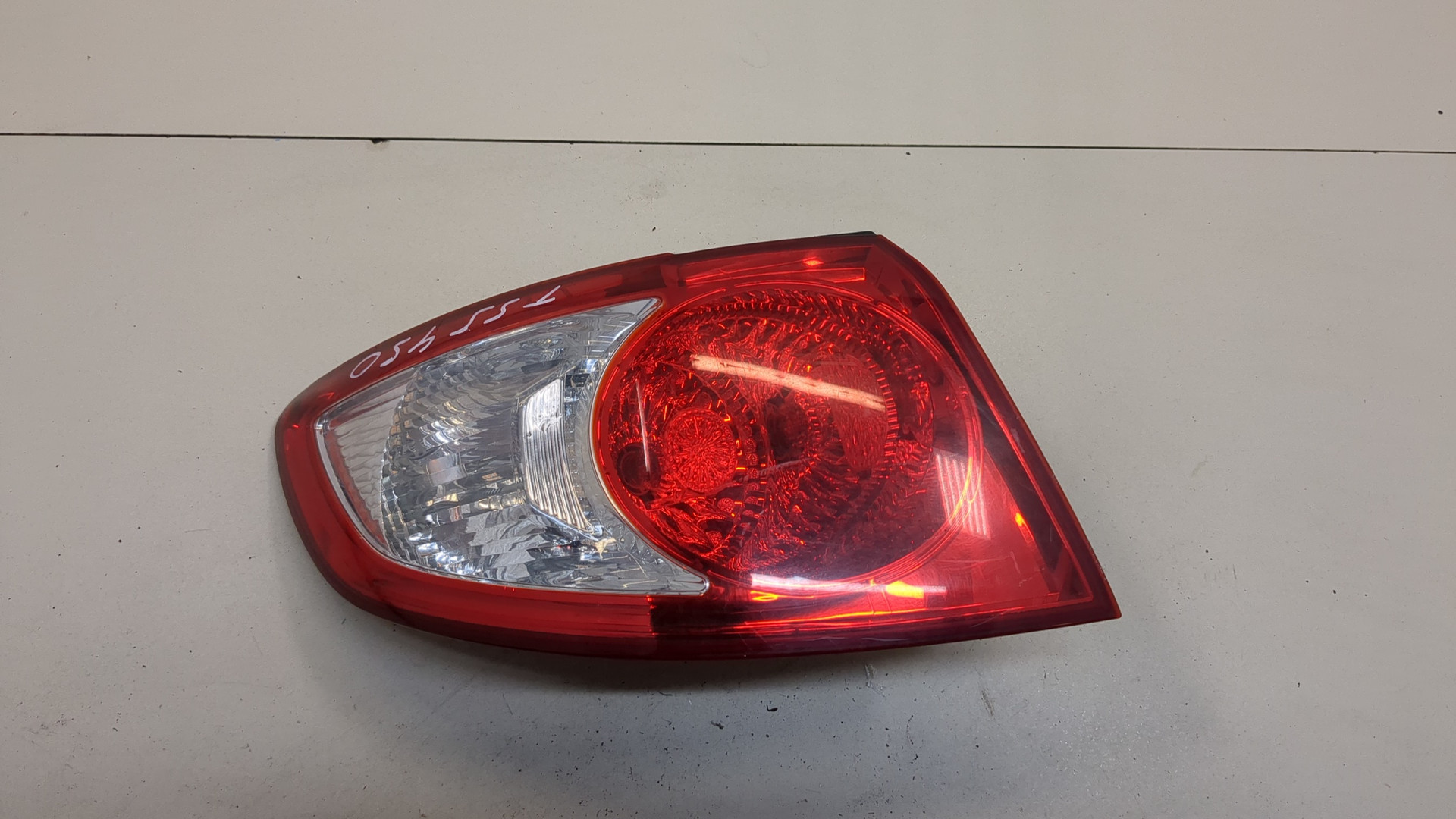 Фонарь задний левый