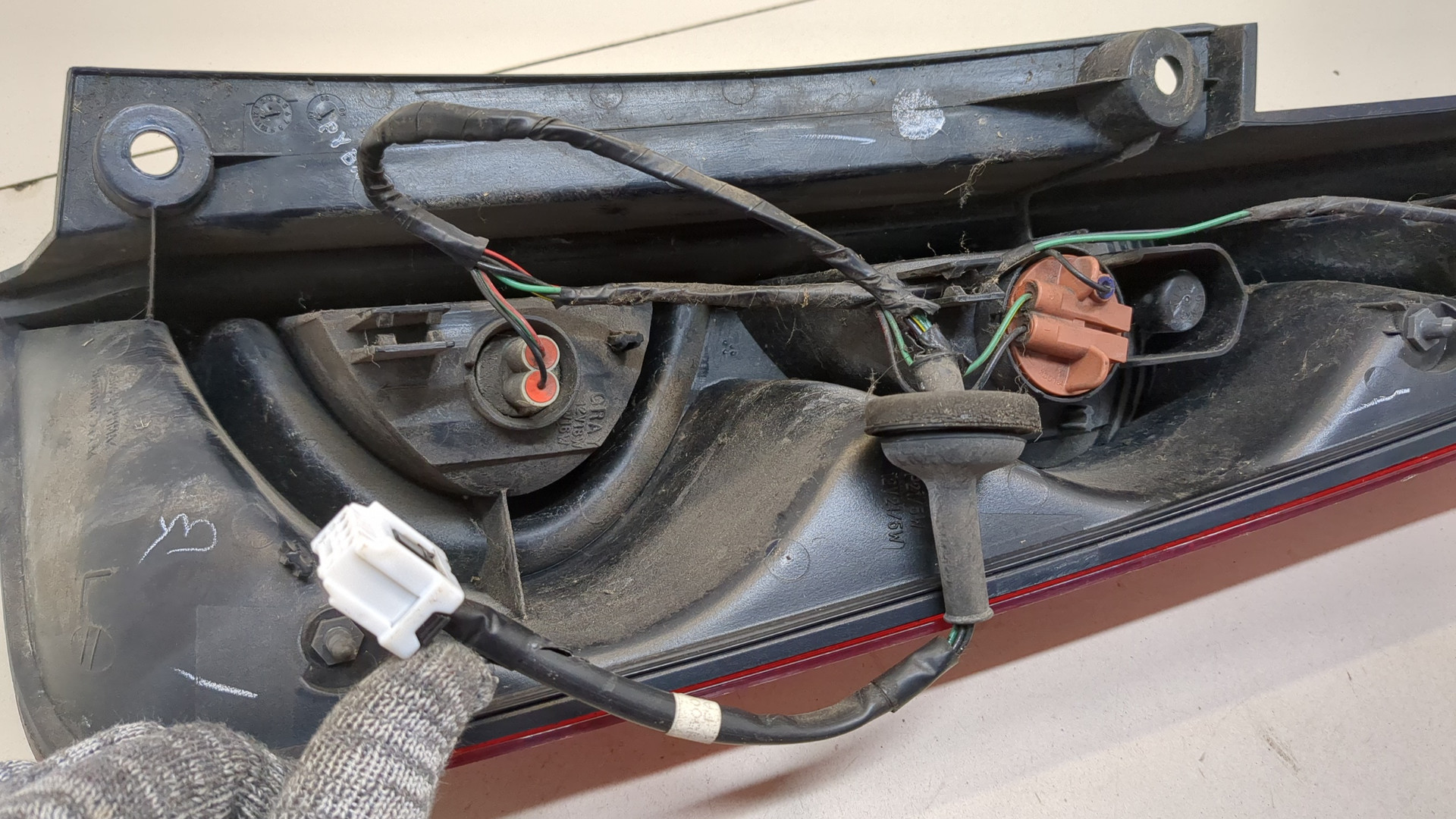 Фонарь задний левый