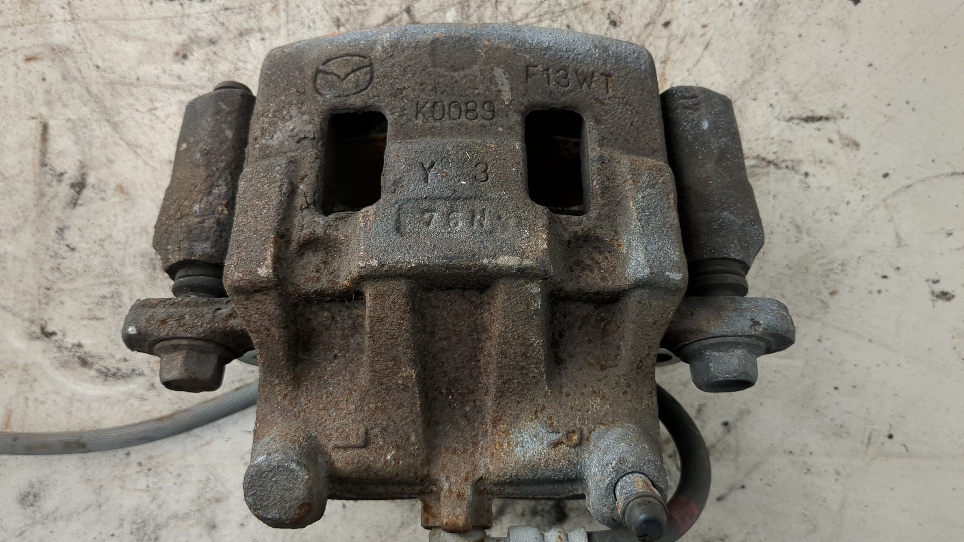 Суппорт передний левый