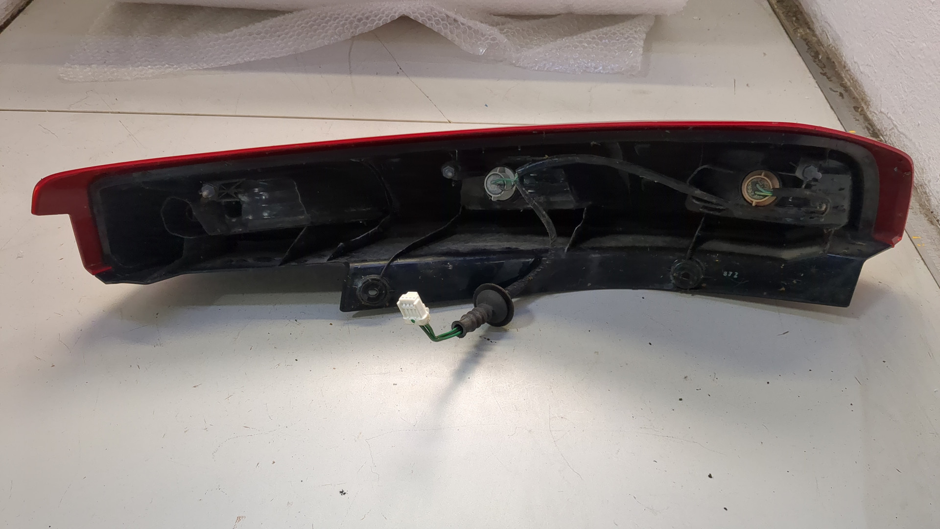 Фонарь задний левый