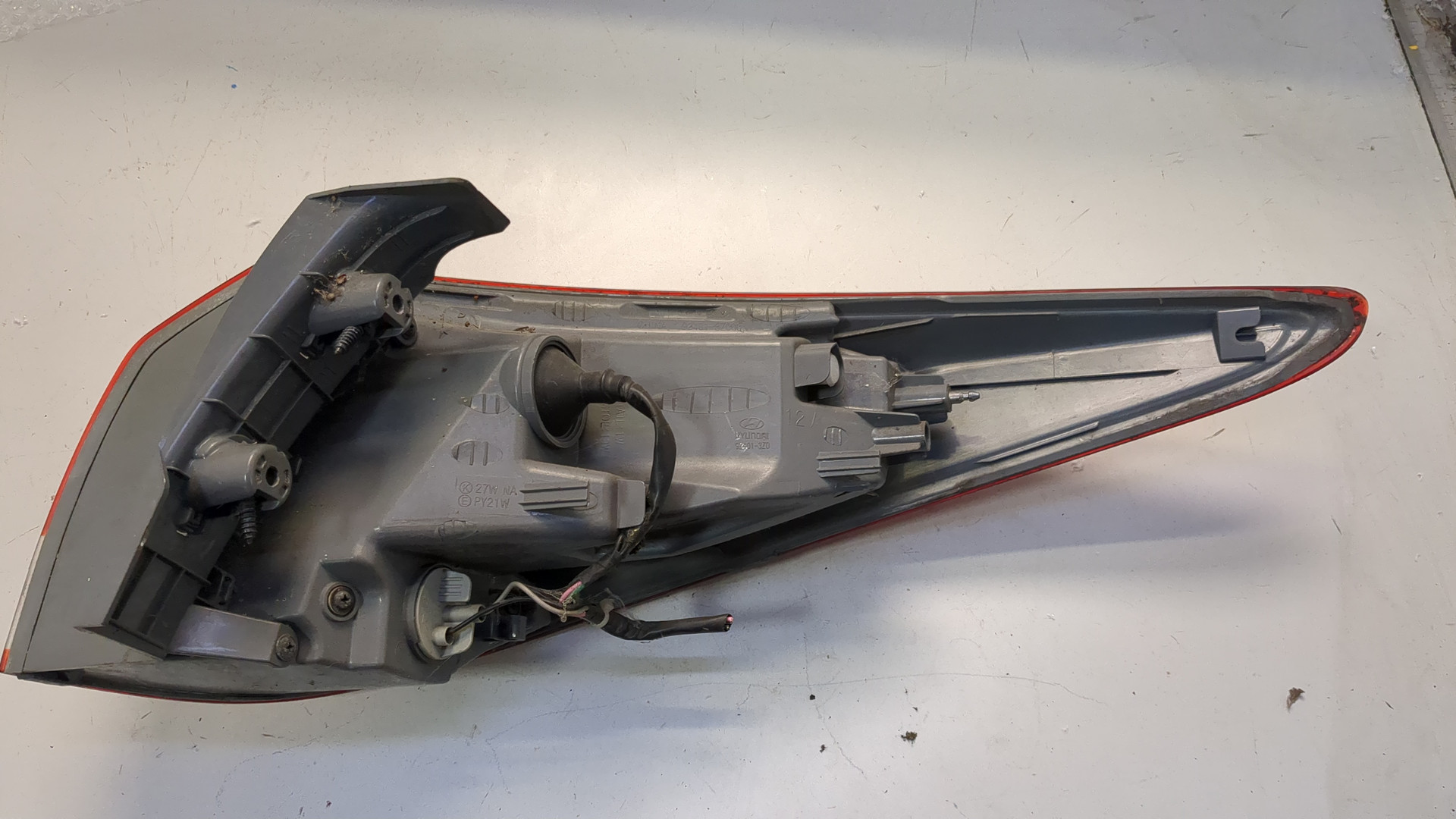 Фонарь задний левый