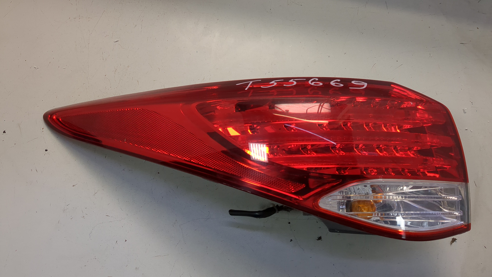 Фонарь задний левый