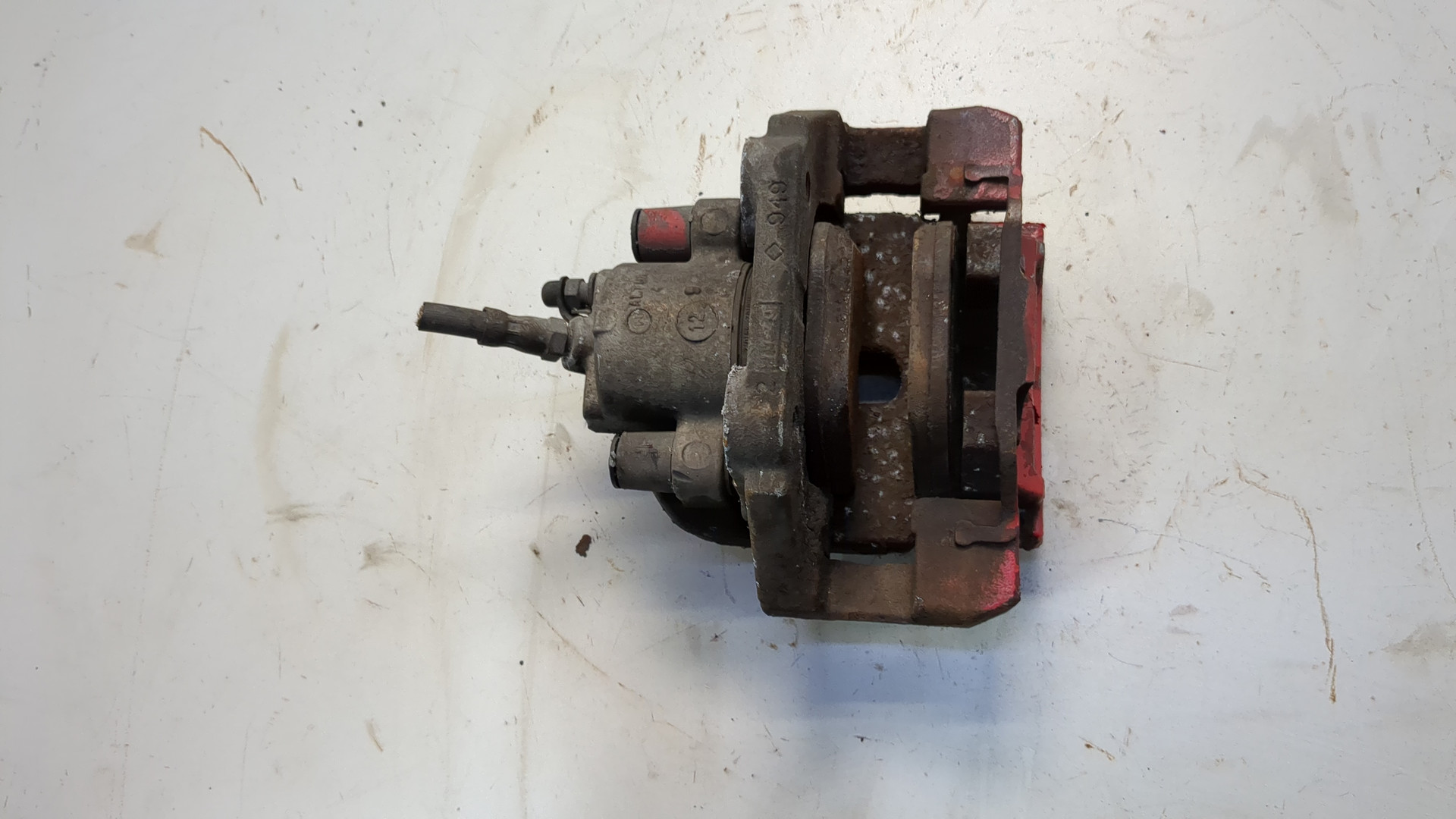 Суппорт задний левый