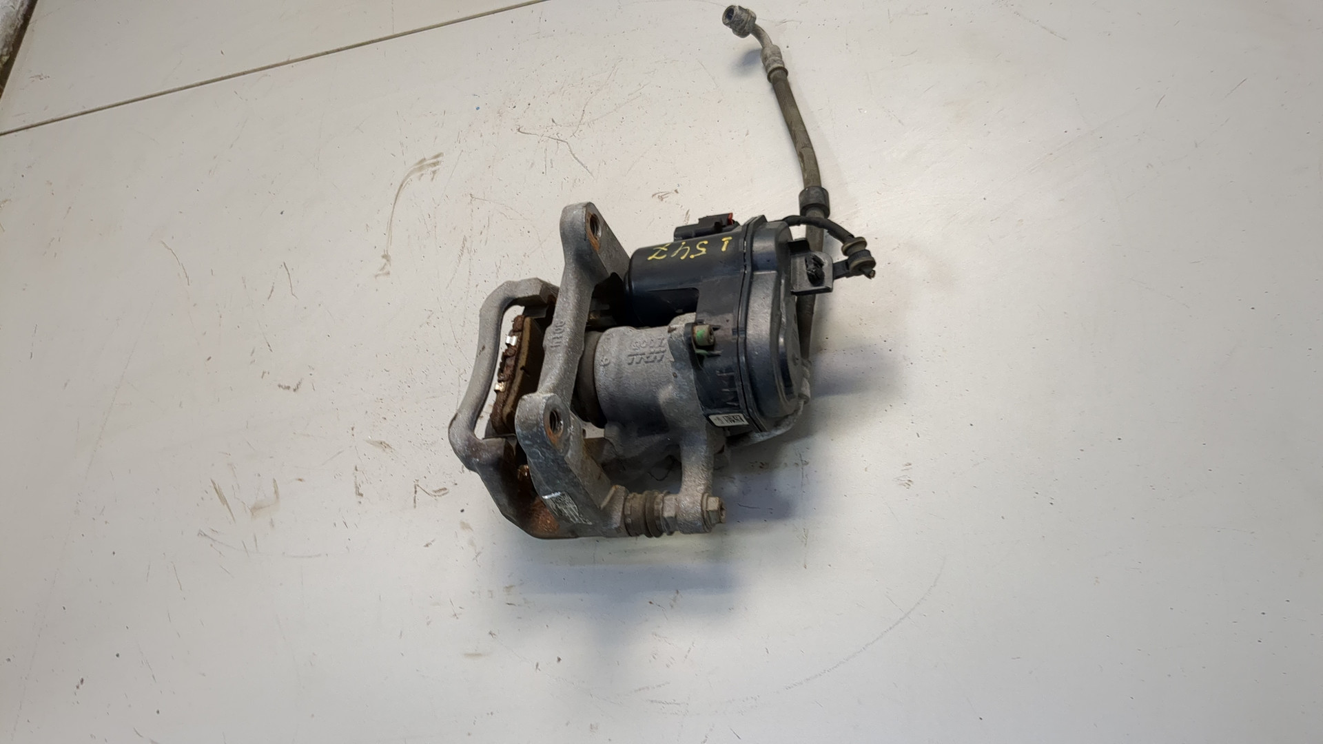 Суппорт задний левый