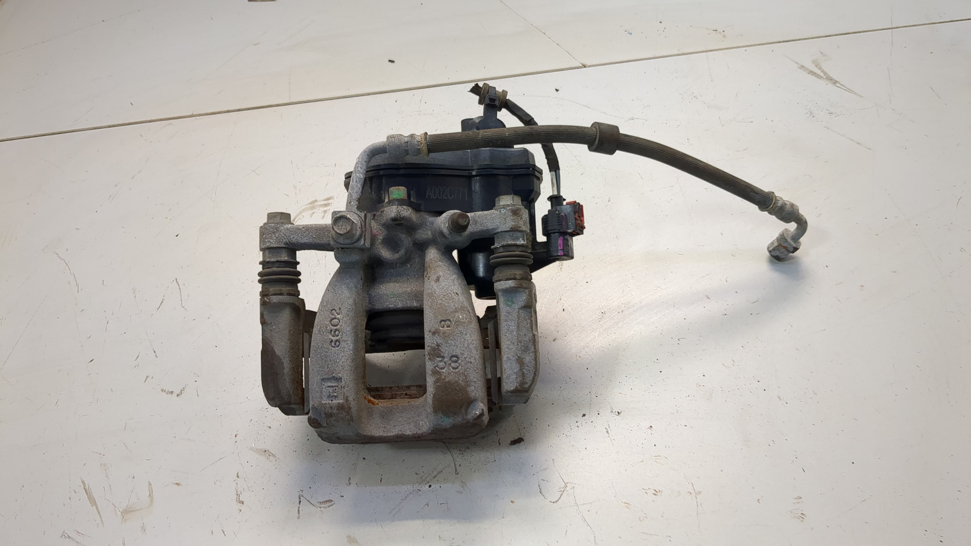 Суппорт задний левый